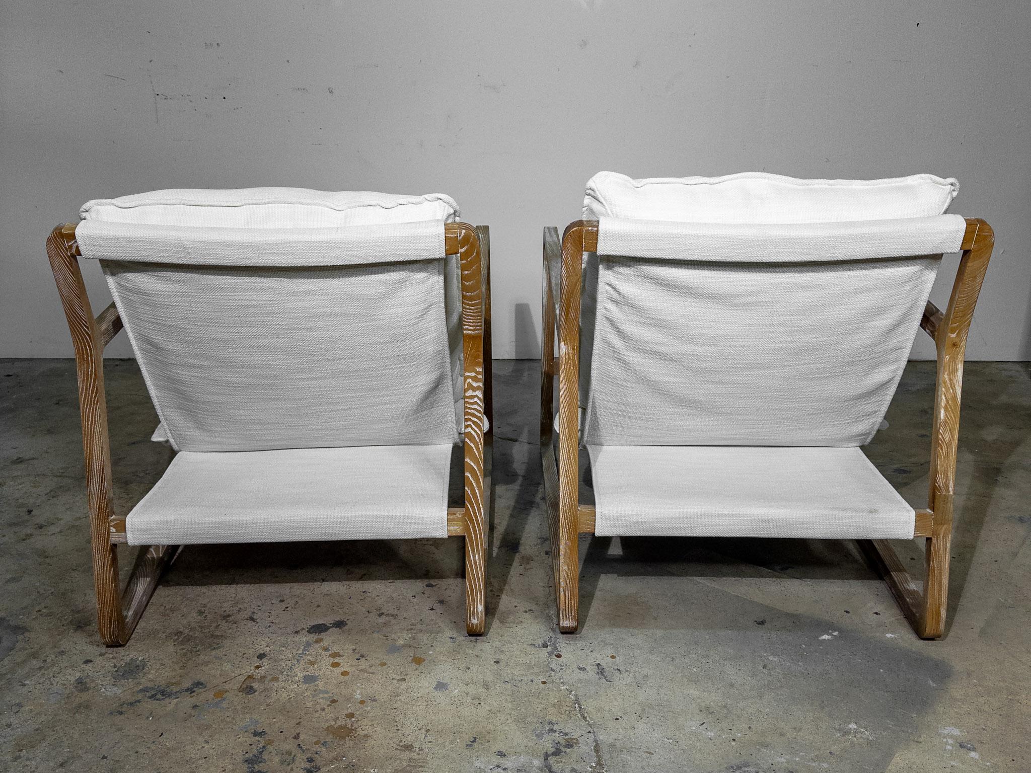 Pair of White Upholstered Sling Chairs with Cushions 1