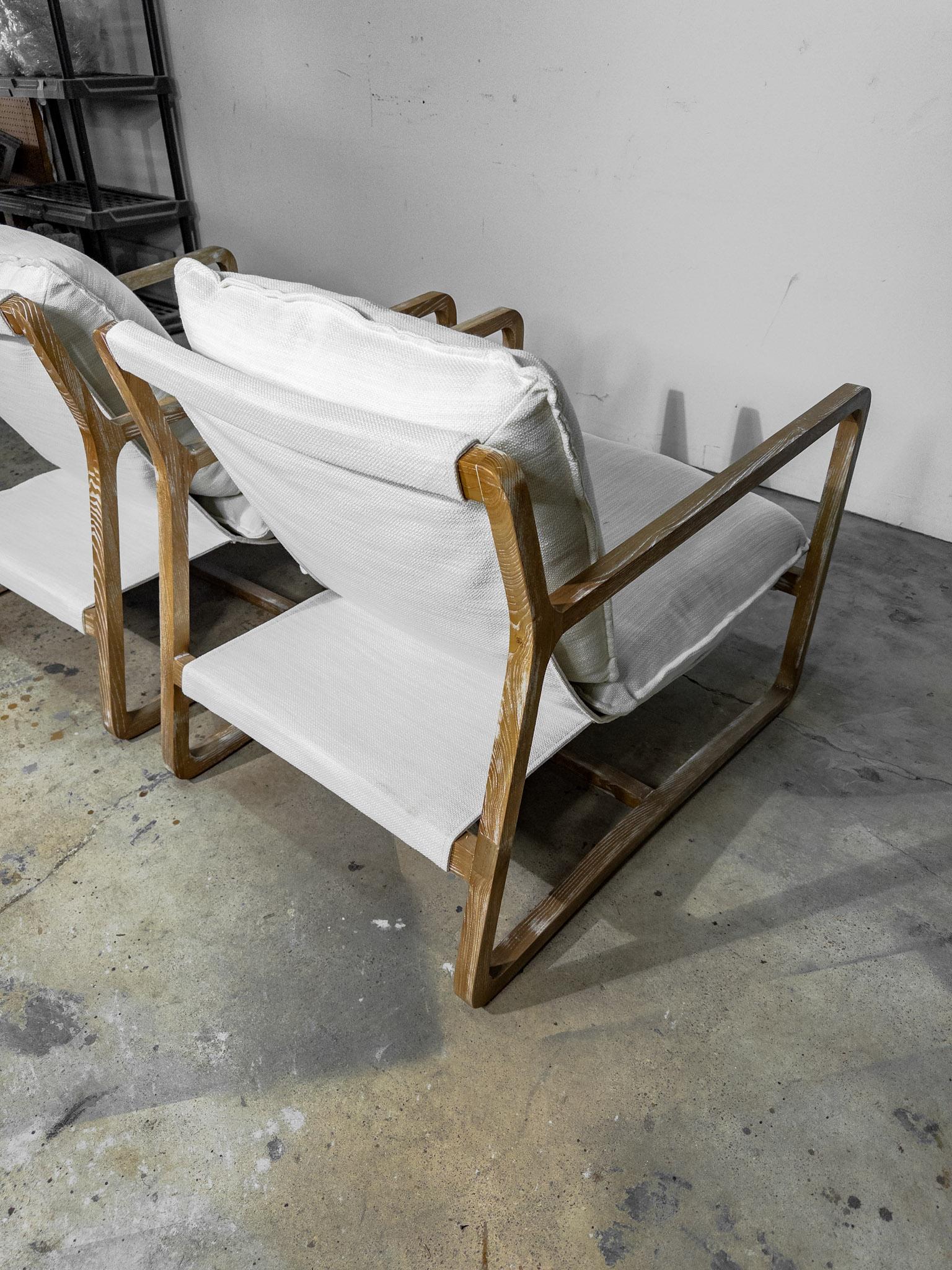Pair of White Upholstered Sling Chairs with Cushions 2