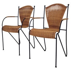 Coppia di poltrone in vimini e ferro di Frederic Weinberg, USA, anni '50 Coppia di poltrone in vimini e ferro di Frederic Weinberg, USA, anni '50