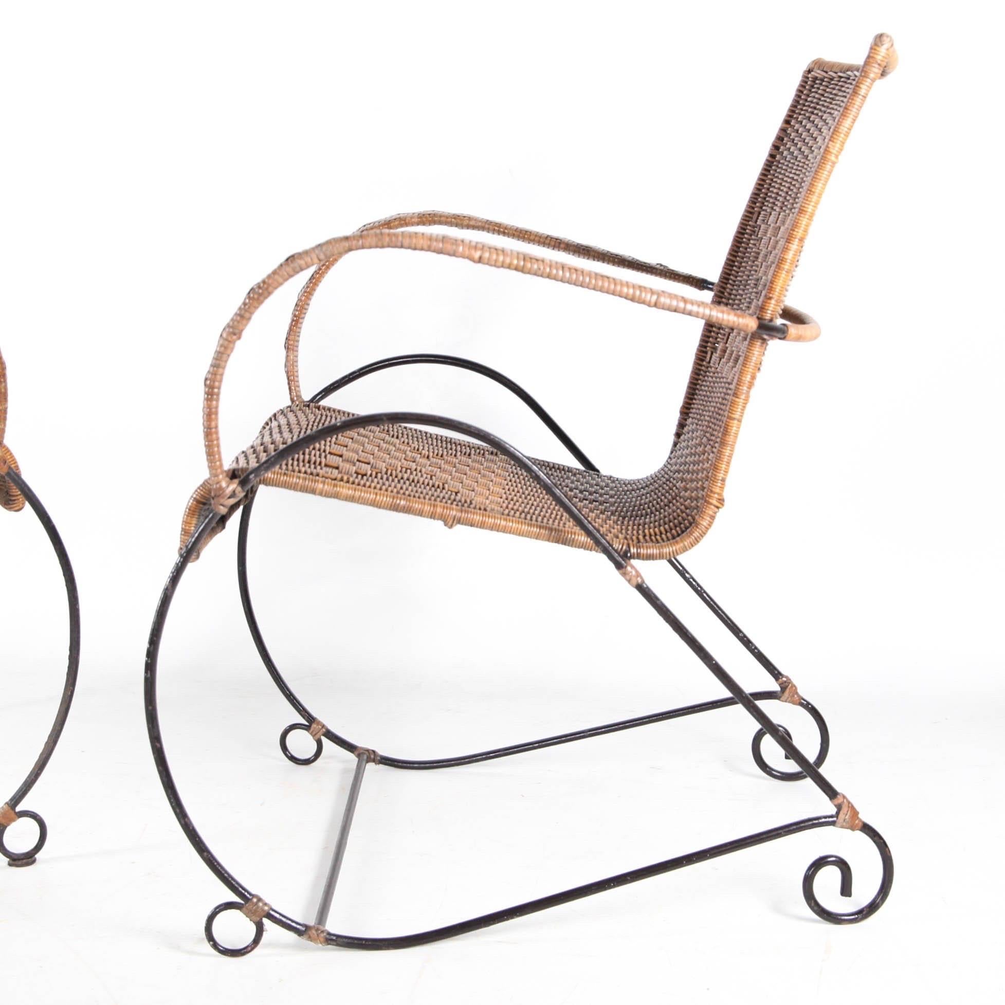 Pair of wicker and iron armchairs For Sale 1