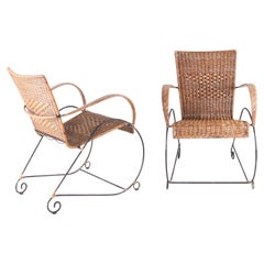 Pair of wicker and iron armchairs