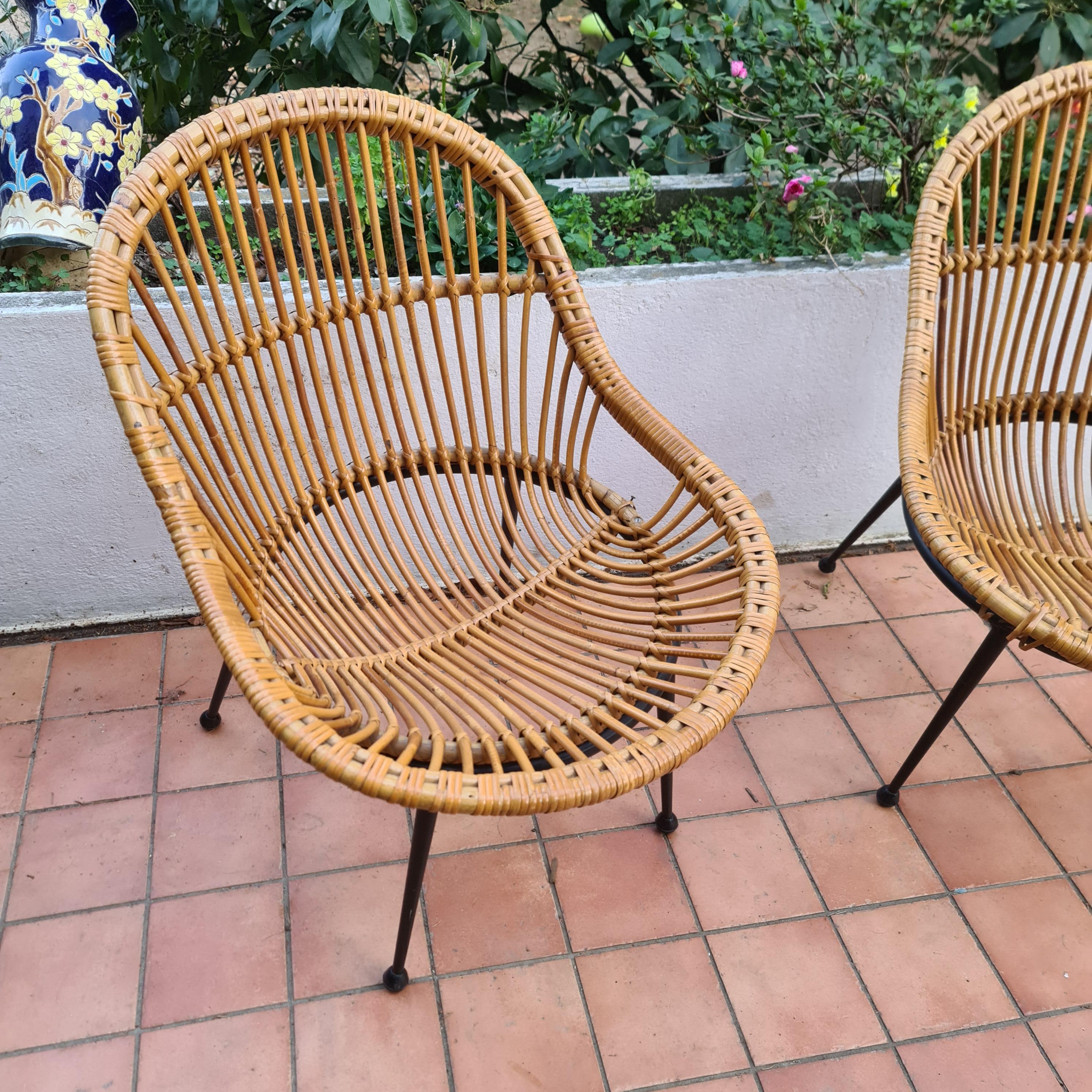 Metal pair of wicker armchairs and black lacquered metal foot Italy circa 1960 For Sale