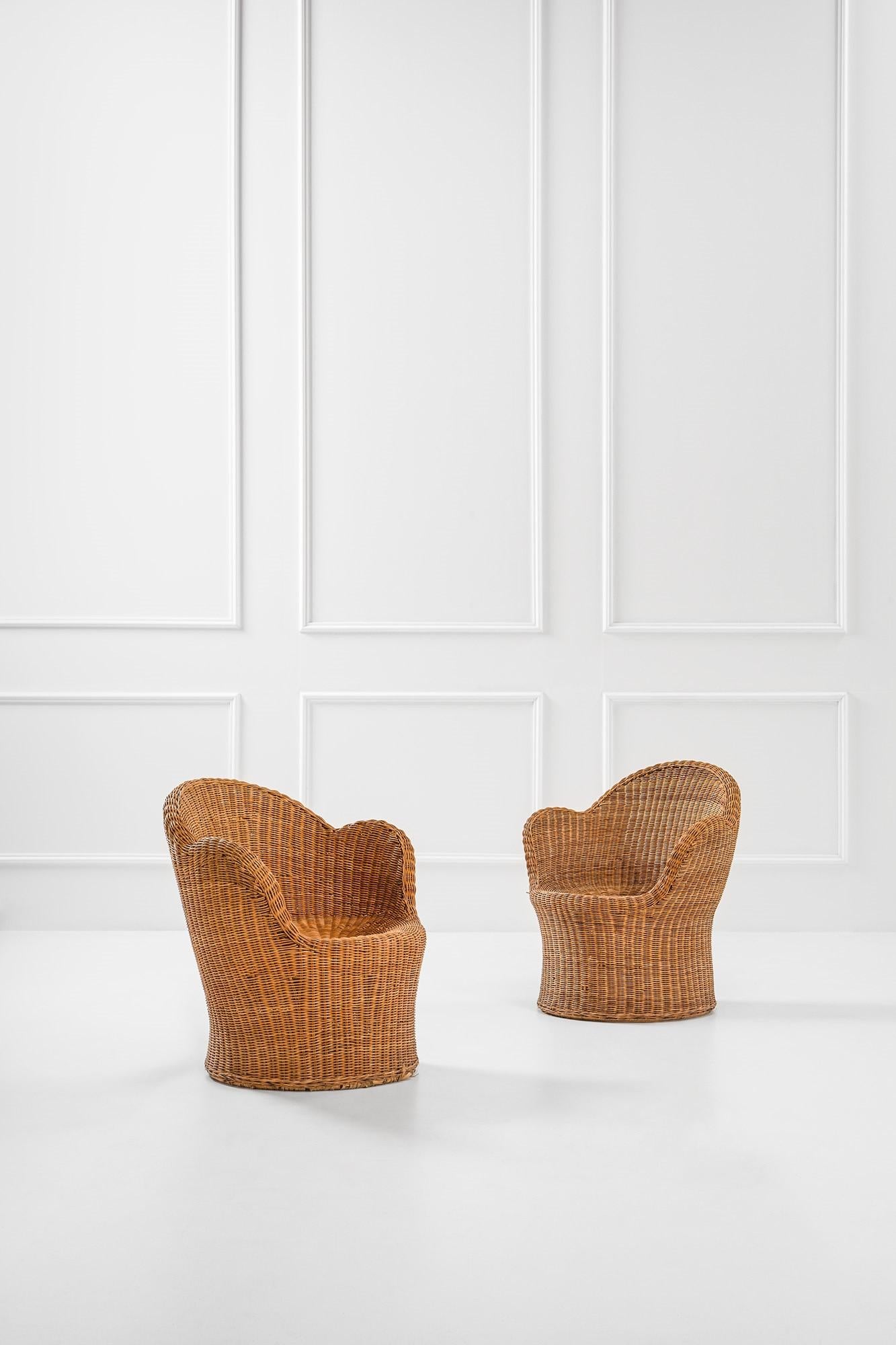 Pair of wicker armchairs by Vivai del Sud, 1970 (set of 2)
Made of wicker and rattan.
Dimensions 67L x 75H x 63D cm
Production: Vivai del Sud, circa 1970.