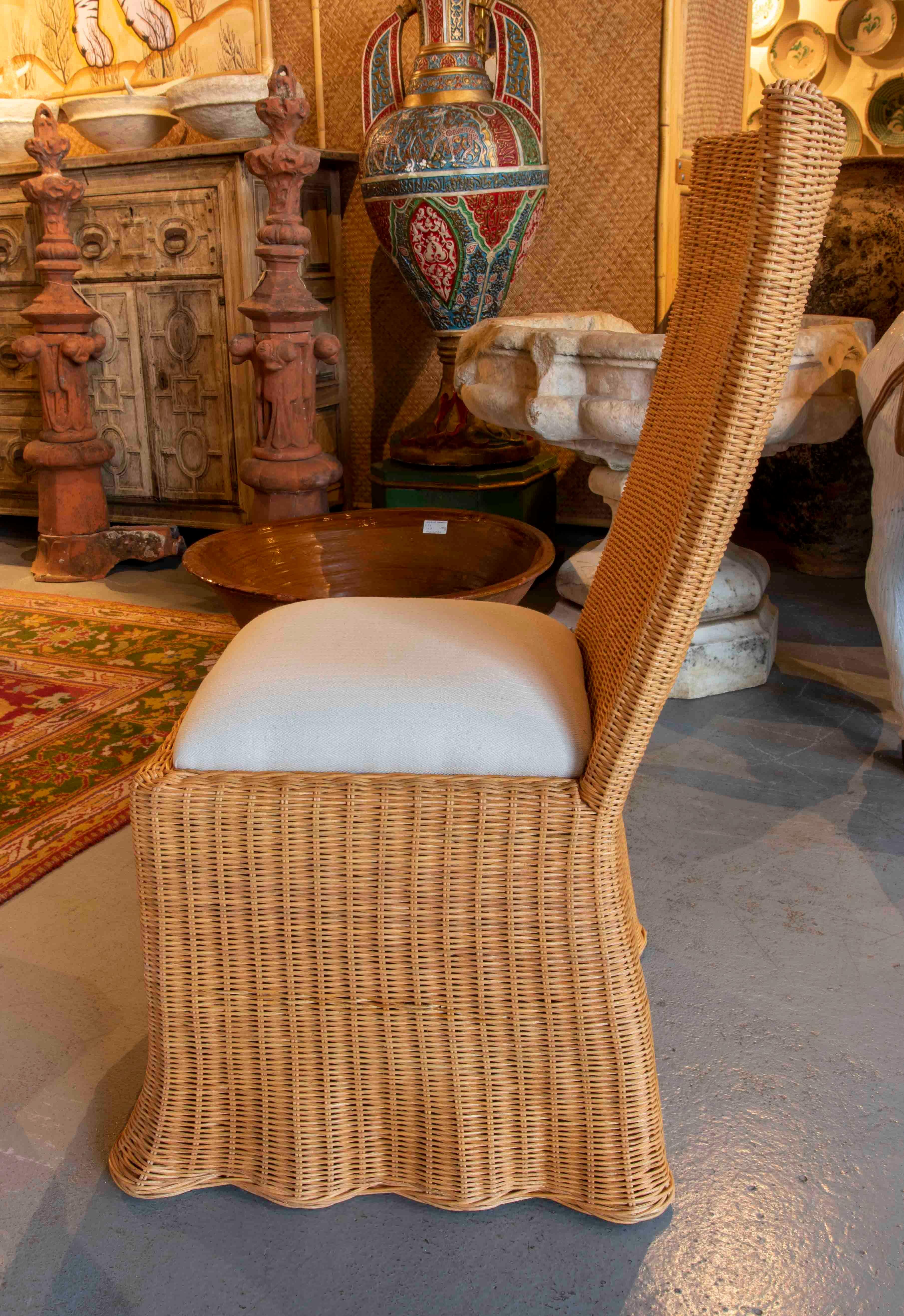 Contemporary Pair of Wicker Chairs with Wavy Shapes and White Cushions
