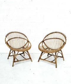 Pair of Italian wicker egg chairs, 1960s