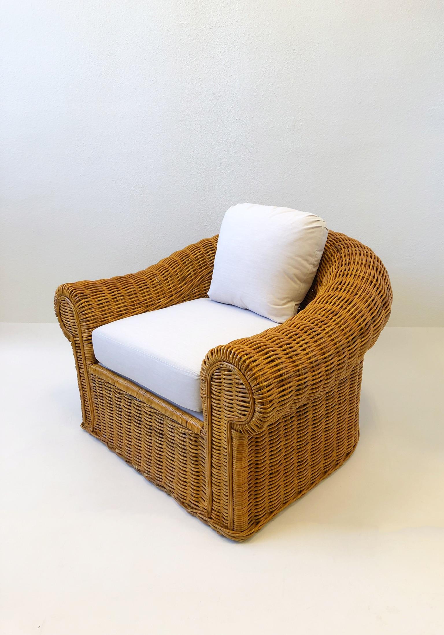 Pair of Wicker Lounge Chairs and Ottoman in the Style of Michael Taylor 1