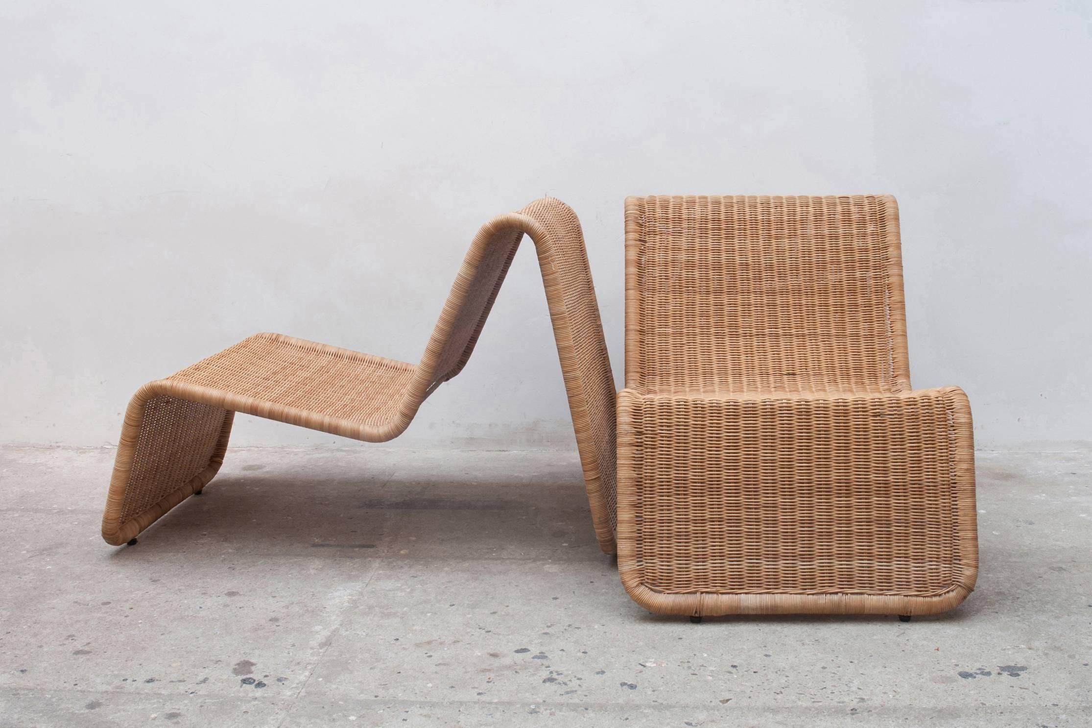 A set of 1970s P3 wicker lounge chairs perfectly formed with great sculptural qualities designed by Tito Agnoli, Italy.

Lacquered tubular steel frame with woven wicker seat and back rest.
Perfect for indoor and outdoor.
Shipping