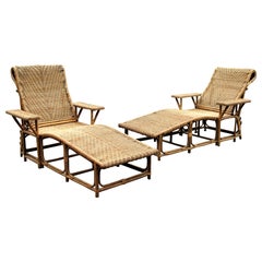 Retro Pair of Wicker Rattan Paddle Arm Reclining Chaise Lounges