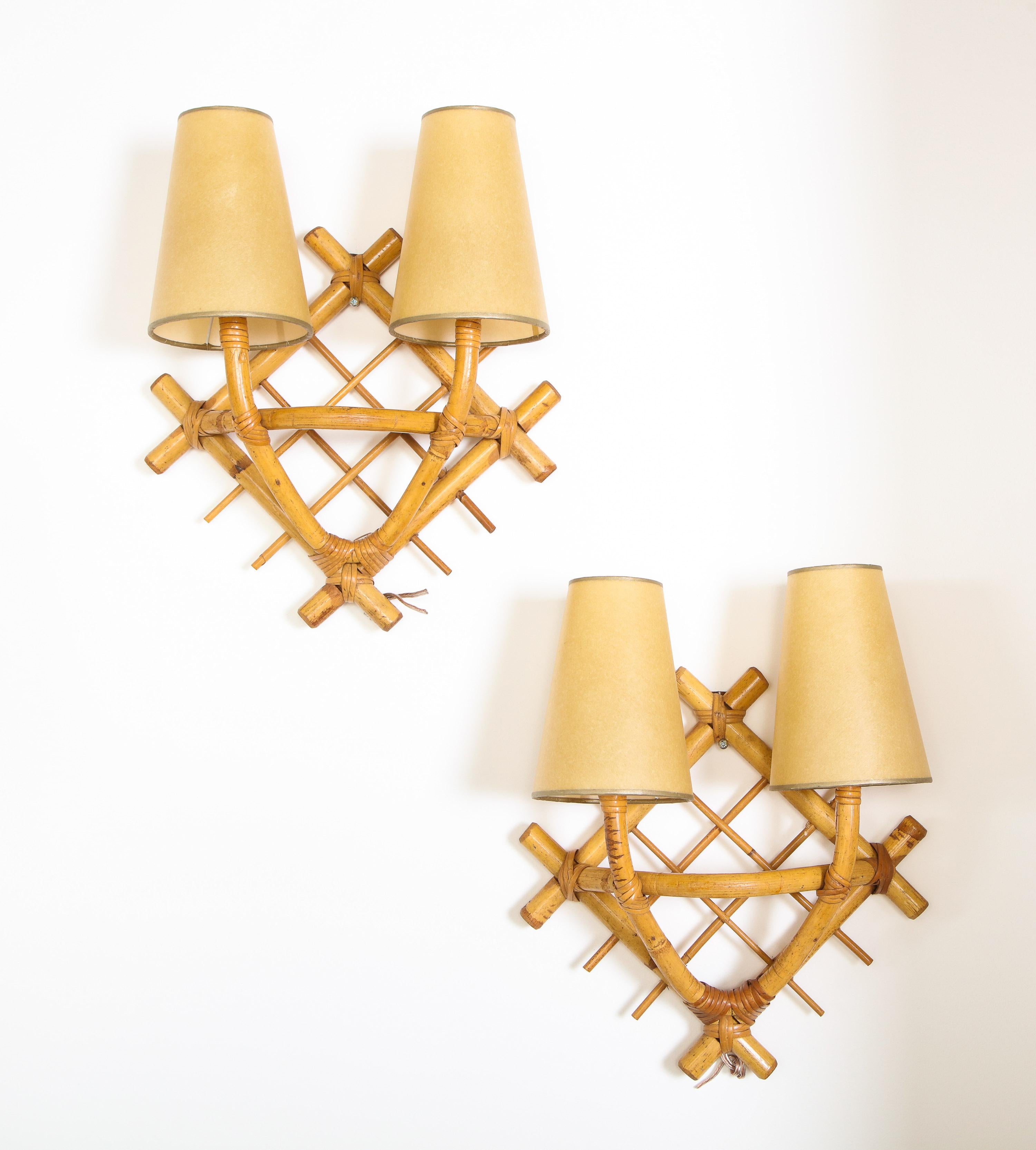 Pair of wicker sconces, France, 1950.