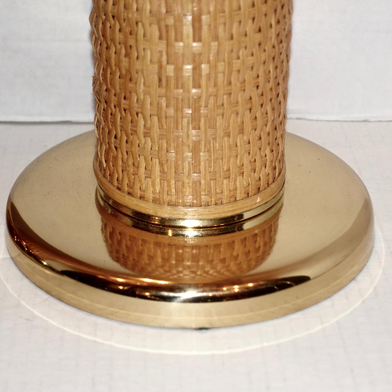 Pair of American circa 1960's wicker table lamps with brass bases.

Measurements:
Height of body: 20