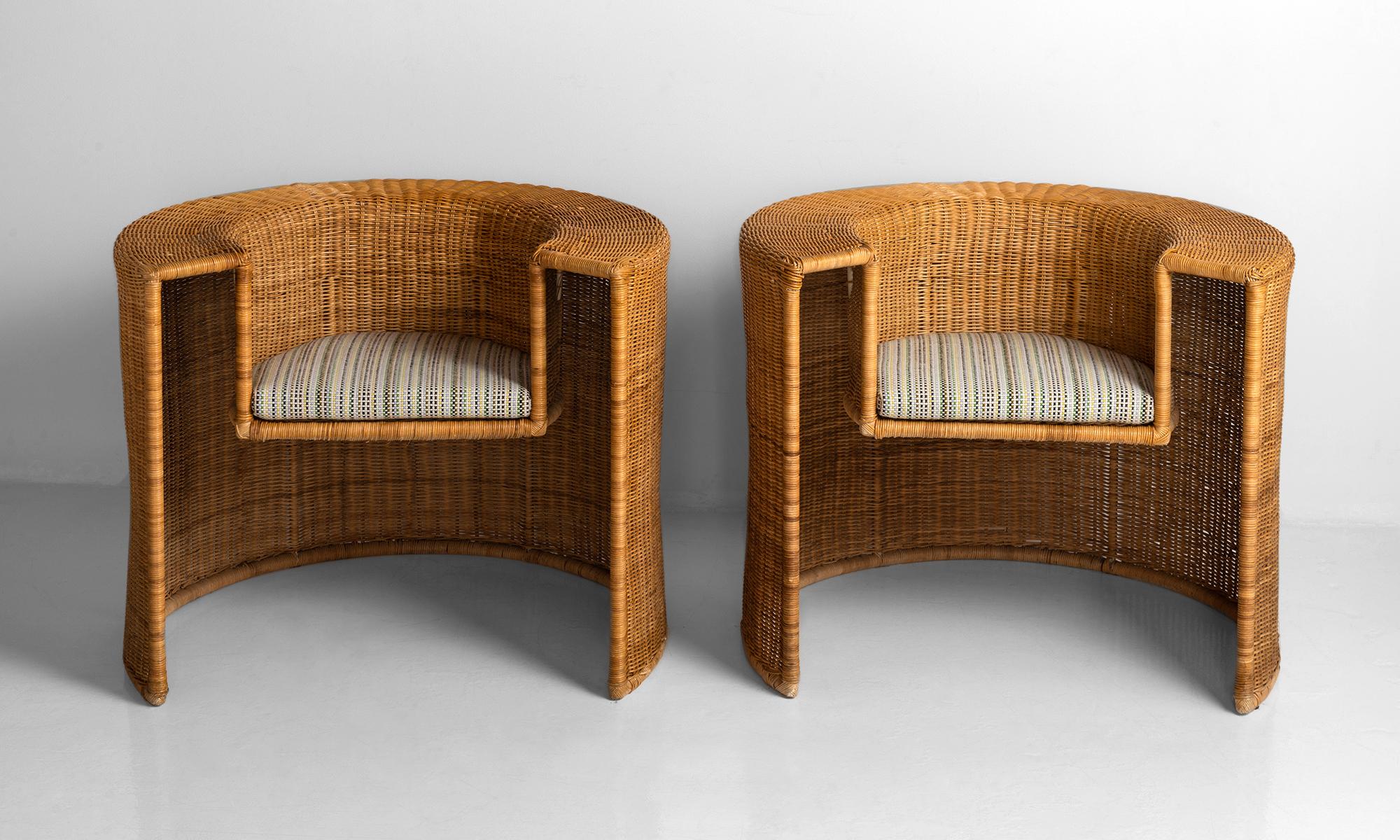 Pair of wicker tub chairs, France, circa 1950.

Unique pair of wicker armchairs with newly upholstered cushion in Maharam fabric.