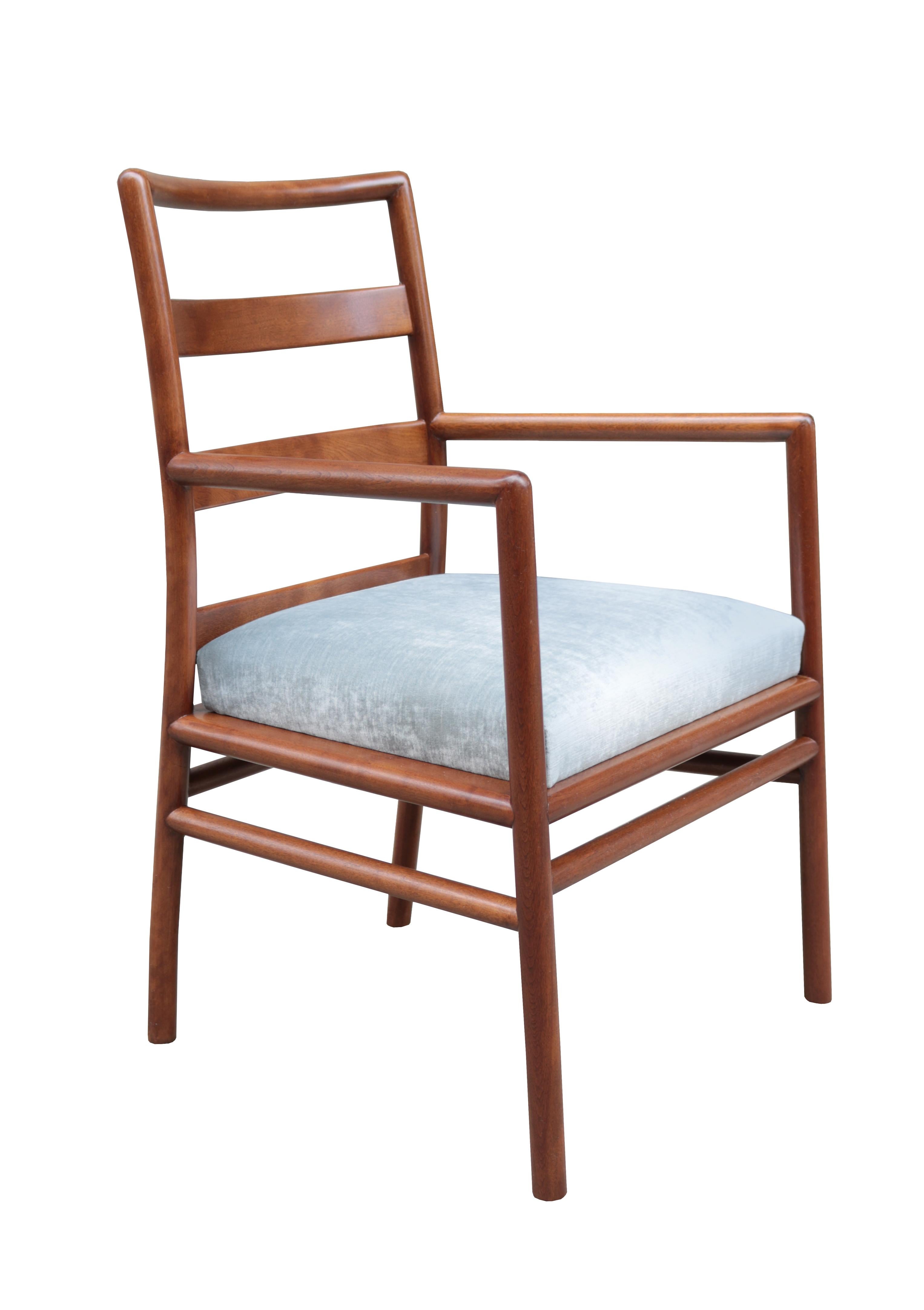 A pair of Widdicomb armchairs designed by T.H. Robsjohn Gibbings.
Mahogany frames.