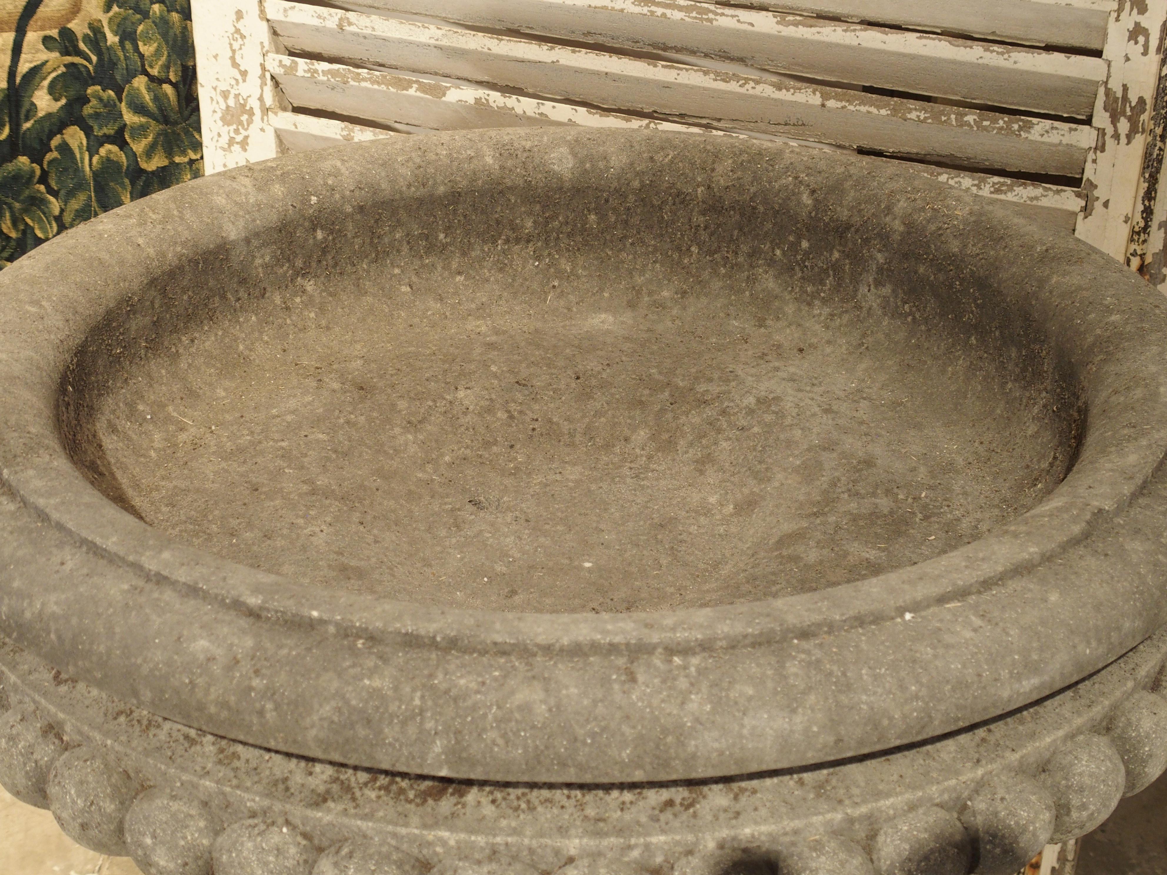 Pair of Wide Lobed Stone Urns on Octagonal Plinths 3
