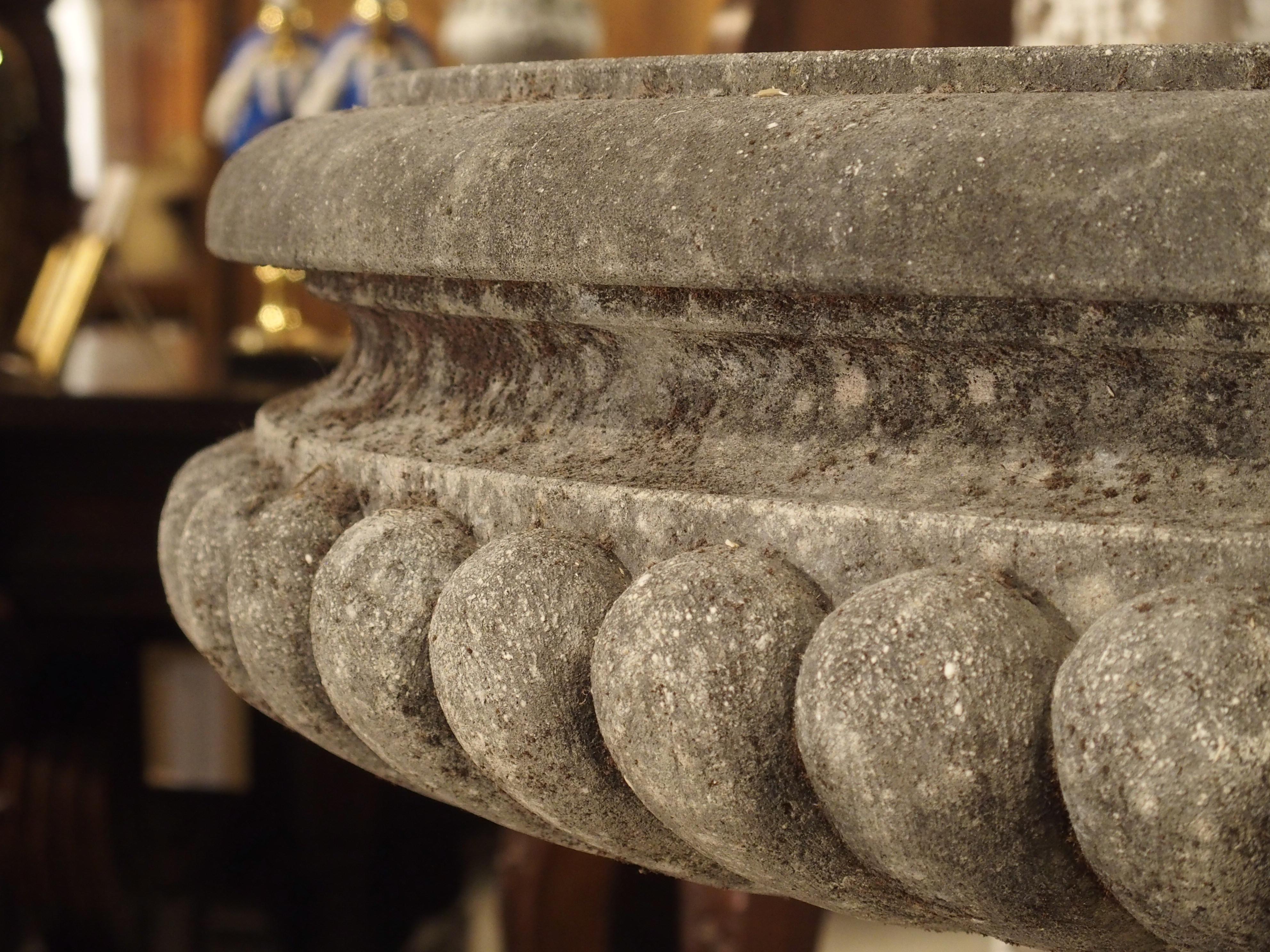Pair of Wide Lobed Stone Urns on Octagonal Plinths 4