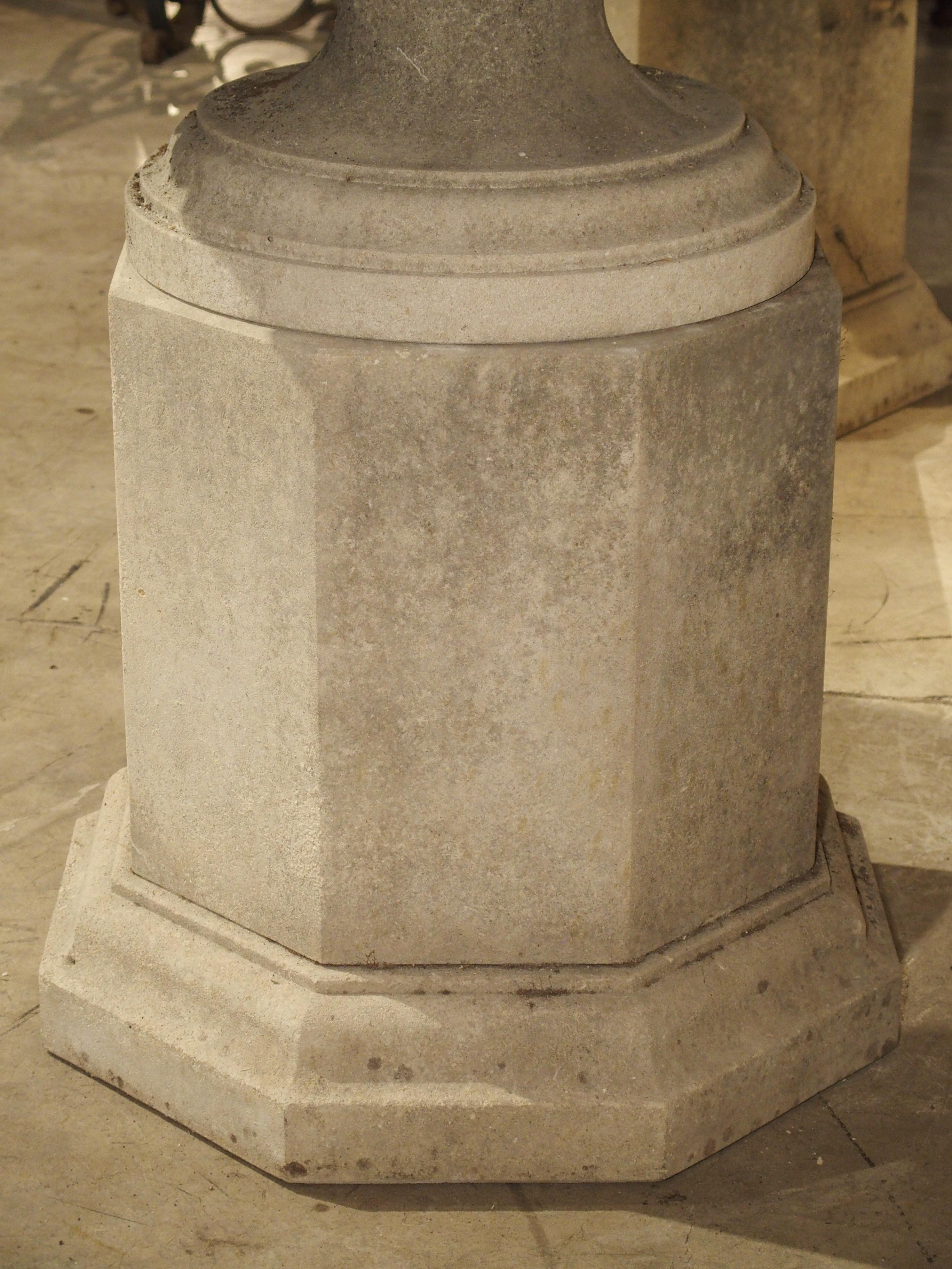 Pair of Wide Lobed Stone Urns on Octagonal Plinths 12