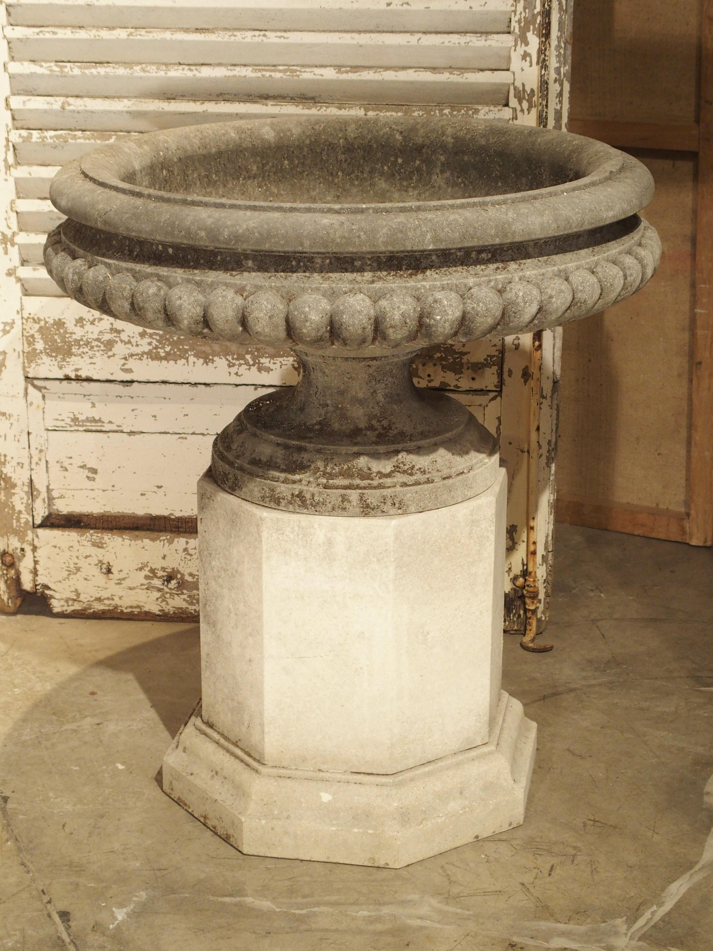 Italian Pair of Wide Lobed Stone Urns on Octagonal Plinths