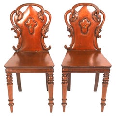 Pair of William IV Carved Mahogany Hall Chairs