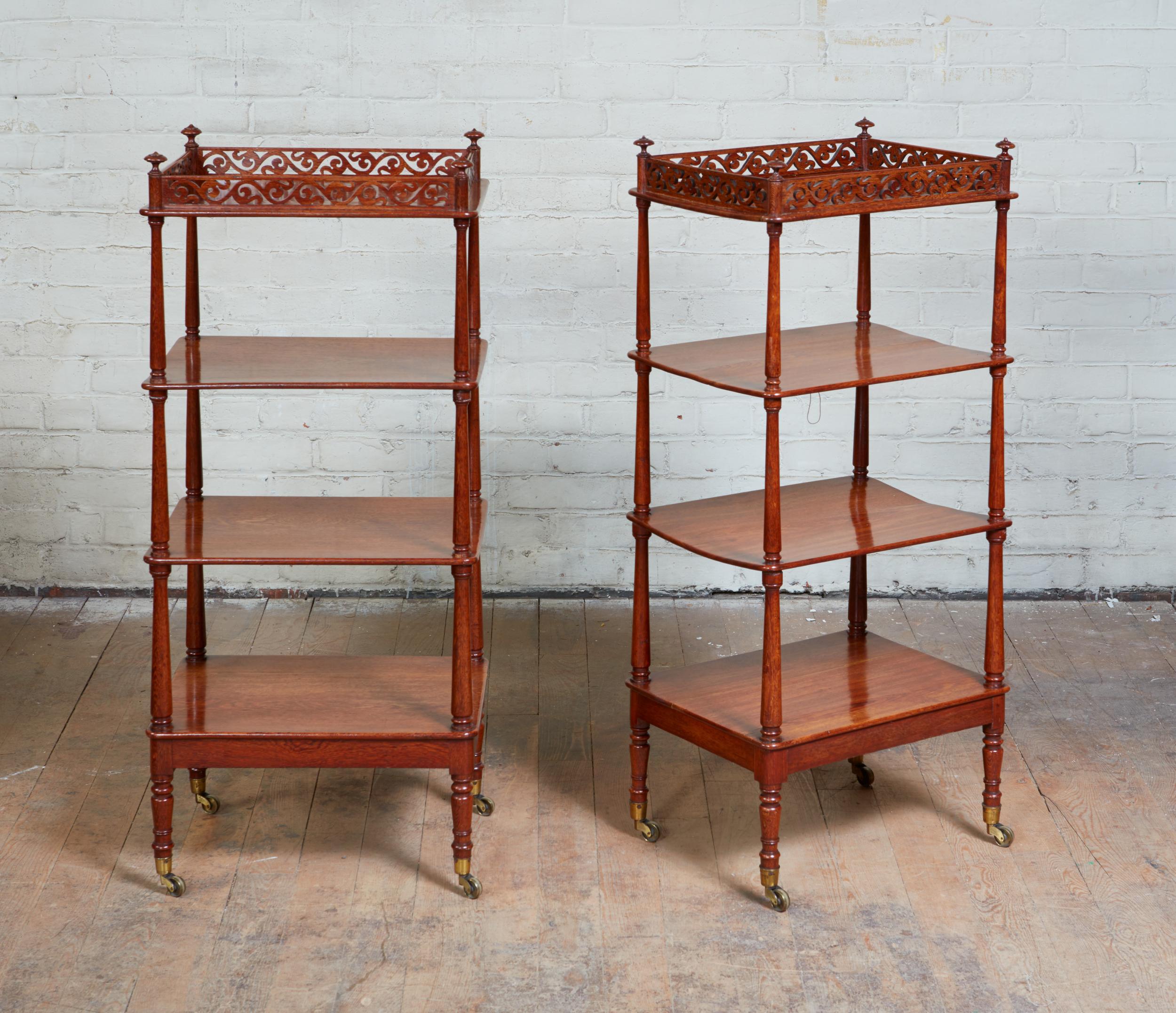 Fine and unusual pair of William IV period étagères having pierced galleries, four shelves and finely turned finials, uprights and legs, all made from an as yet unidentified exotic hardwood, possessing a good mellow surface and retaining original