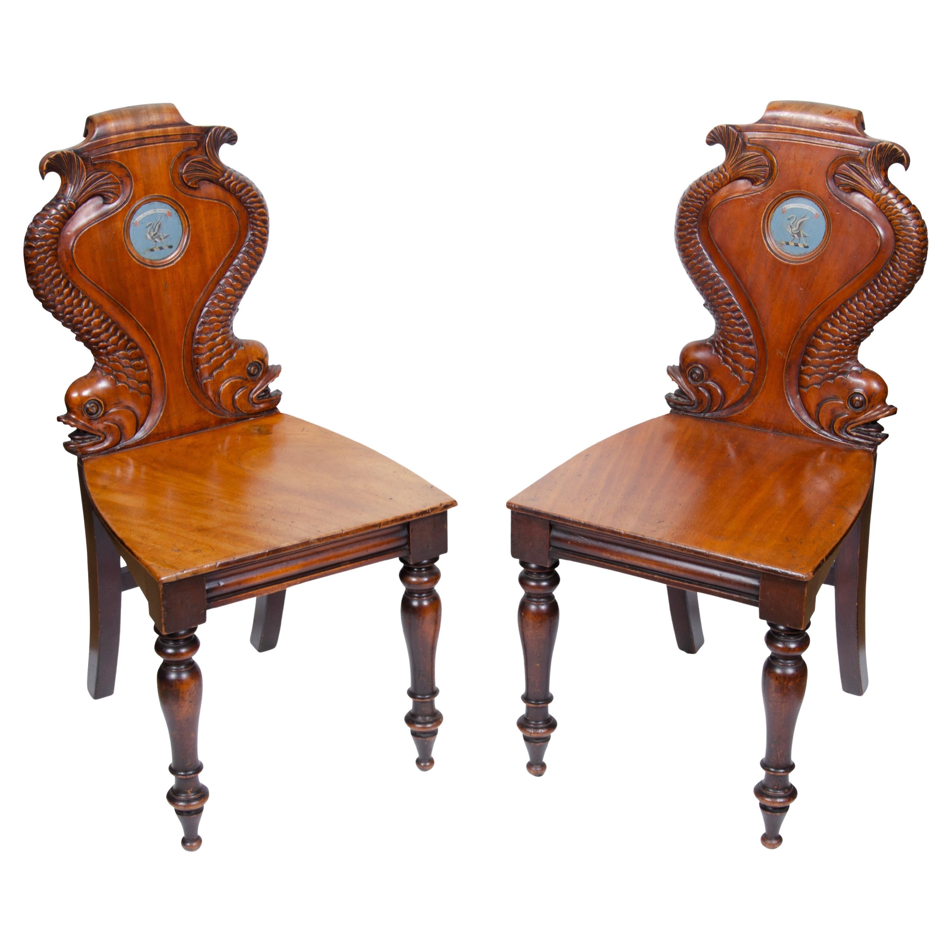 Pair of William IV Mahogany Hall Chairs with Dolphin Carved Backs