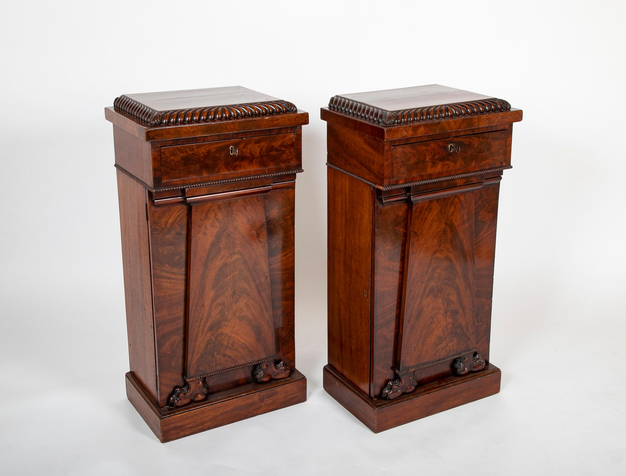 A wonderful pair of William IV mahogany and mahogany veneer pedestal cabinets. Circa 1835.
