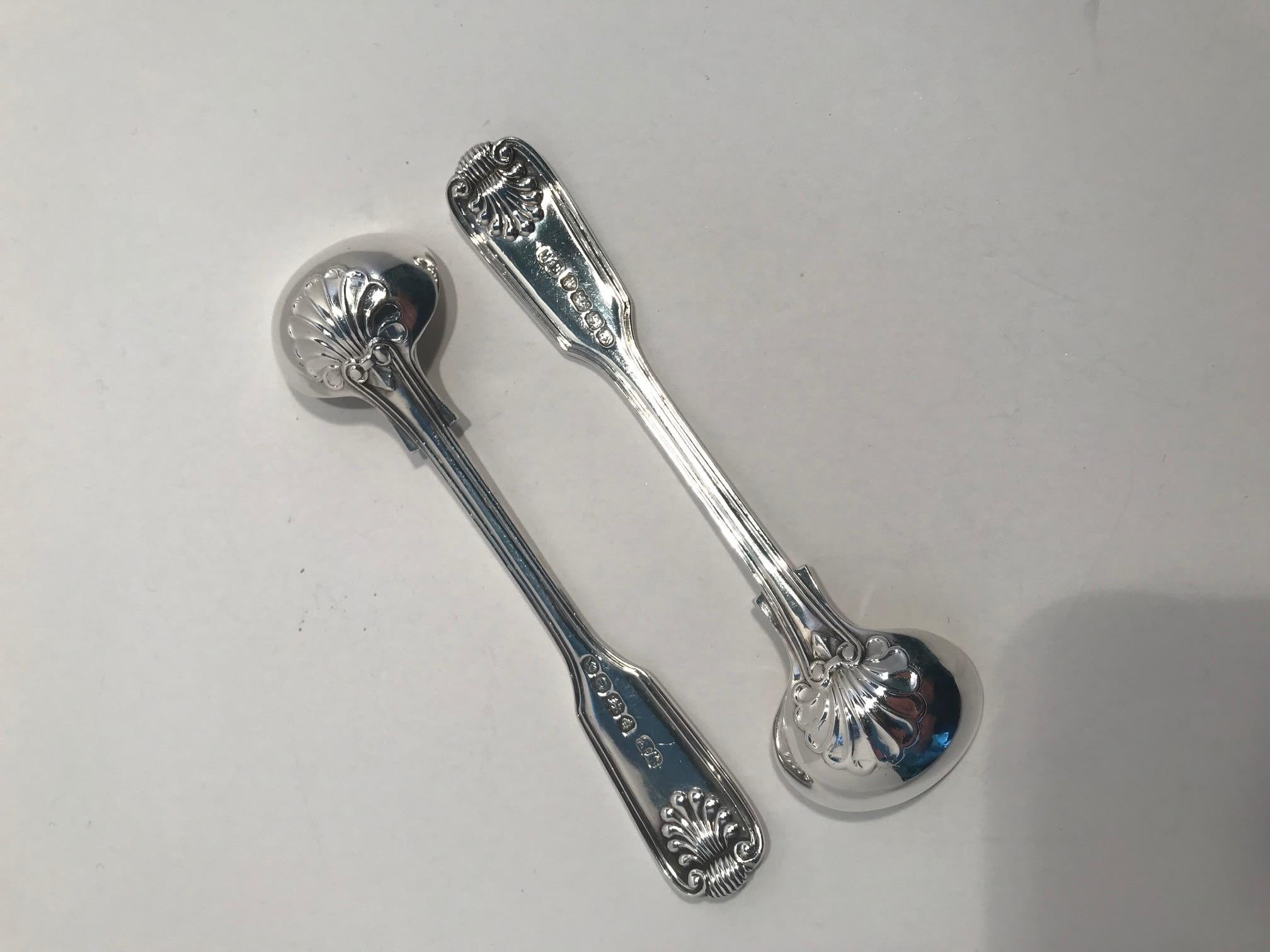 Pair of William IV sterling silver condiment/mustard spoons (could also be used for master salt spoons) by the flatware specialist of his day, William Eaton (1829-1844). The pattern is fiddle, thread and shell with gilt bowls. This renowned