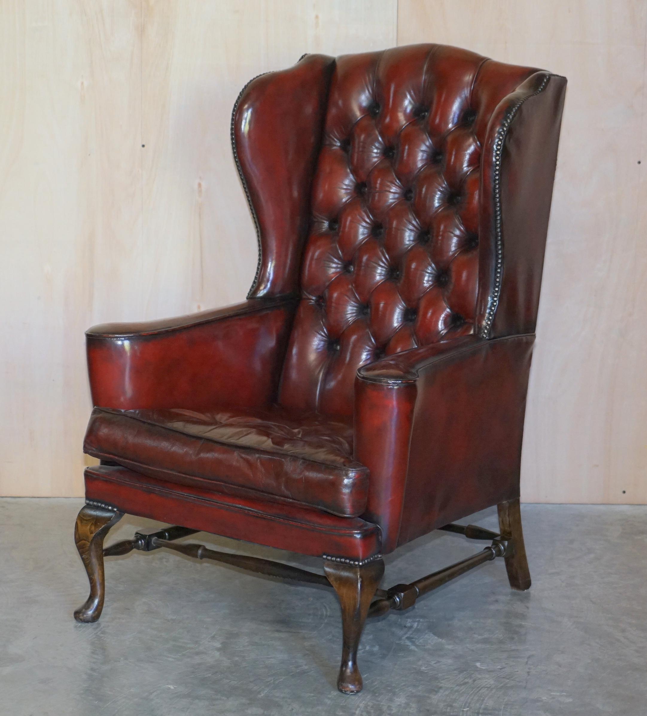 We are delighted to offer for sale this stunning pair of vintage, William Morris flat top arm Chesterfield Bordeaux leather fully restored wingback armchairs with Thomas Chippendale style floating button feather filled cushions 

A good looking