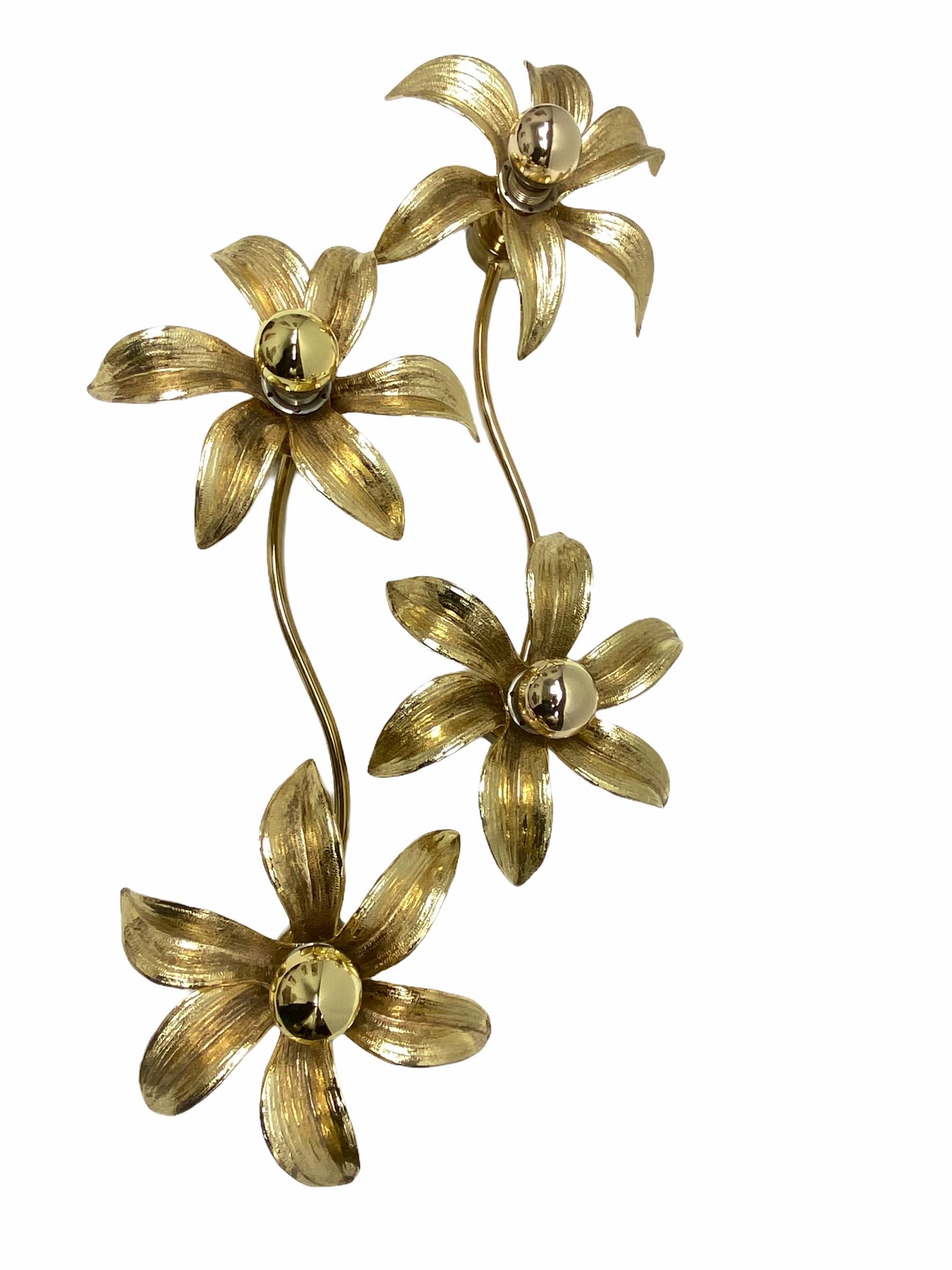 A pair of elegant Willy Daro flower light for ‘Massive Lighting', 1970s. Cast brass flower wall or ceiling light, the light attaches by a plate so can be used either way. The light is wired and in full working order, but as with all our lighting we