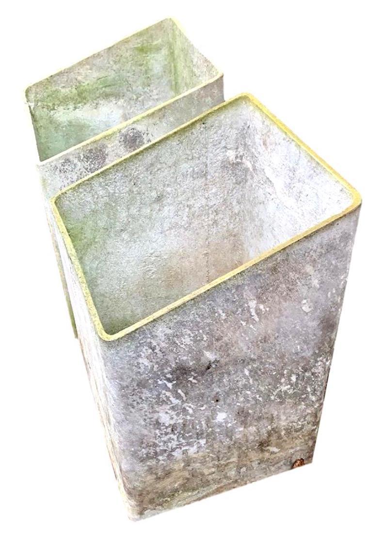 Unique pair of concrete planters by Swiss architect Willy Guhl. Rectangular planters with hollow bottom. Perfect for large plants or small trees. Could also be used indoors to place something inside that you don't want to look at. Super functional