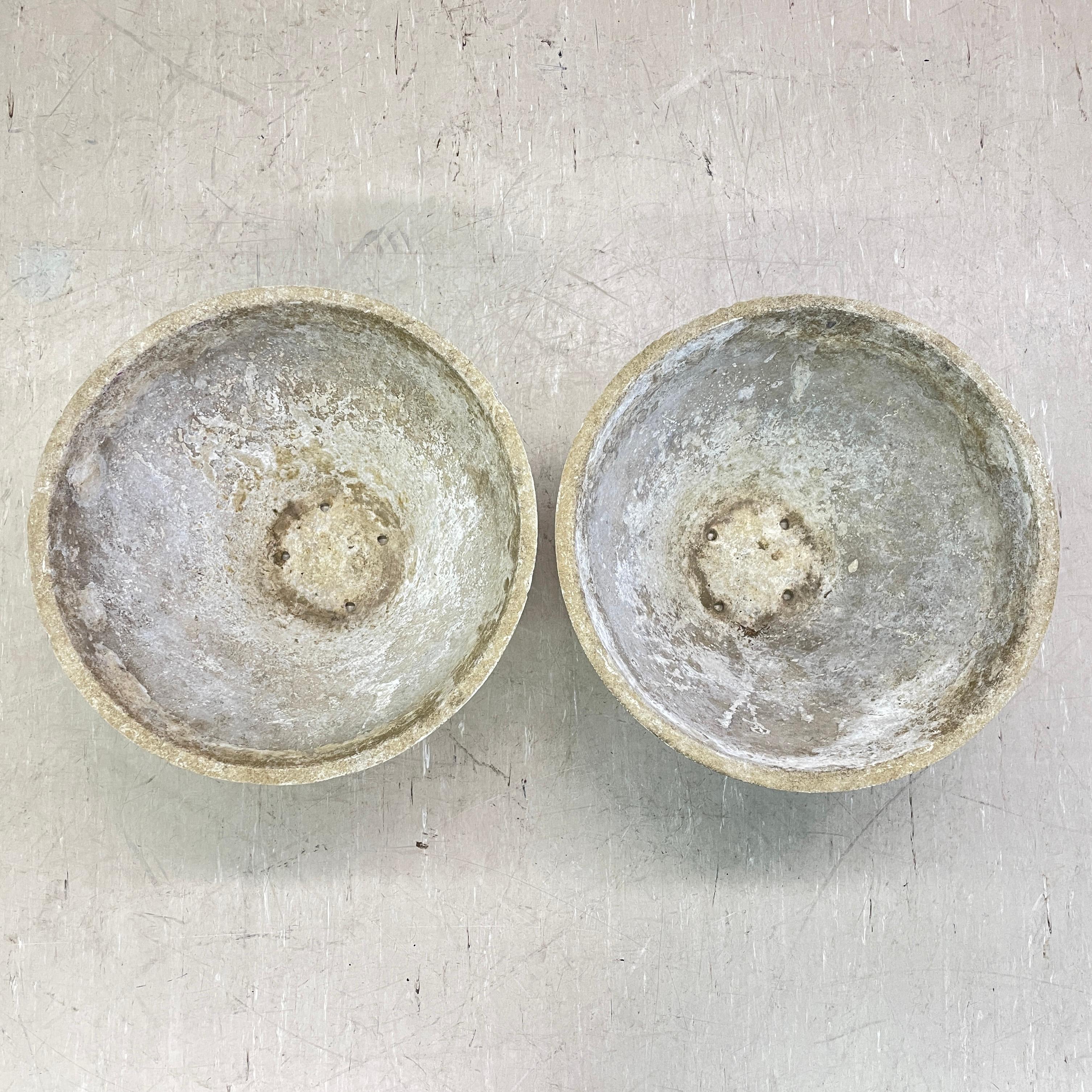 Pair of minimalist conical concrete flower pot by prominent Swiss designer, Willy Guhl. Solid concrete made in Switzerland 1960 - 1970. Produced by Eternit AG, Switzerland. Tapered structure with drainage holes. In original condition with beautiful