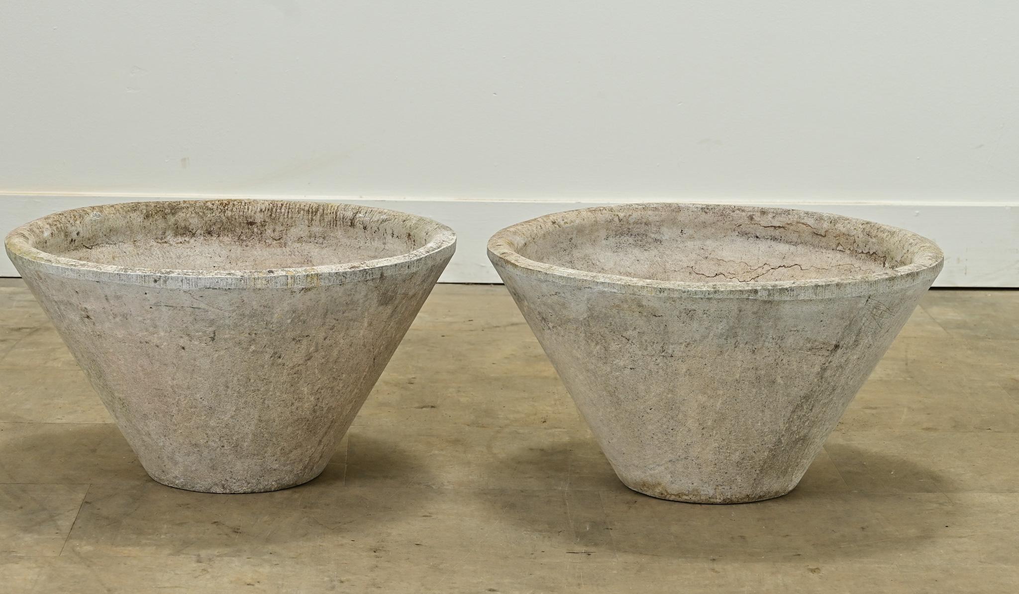 This pair of small cone planters are made of fiber cement from Switzerland. Designed by architect Willy Guhl and produced by Eternit SA during the 1960’s. View all the detailed images to get a closer look.