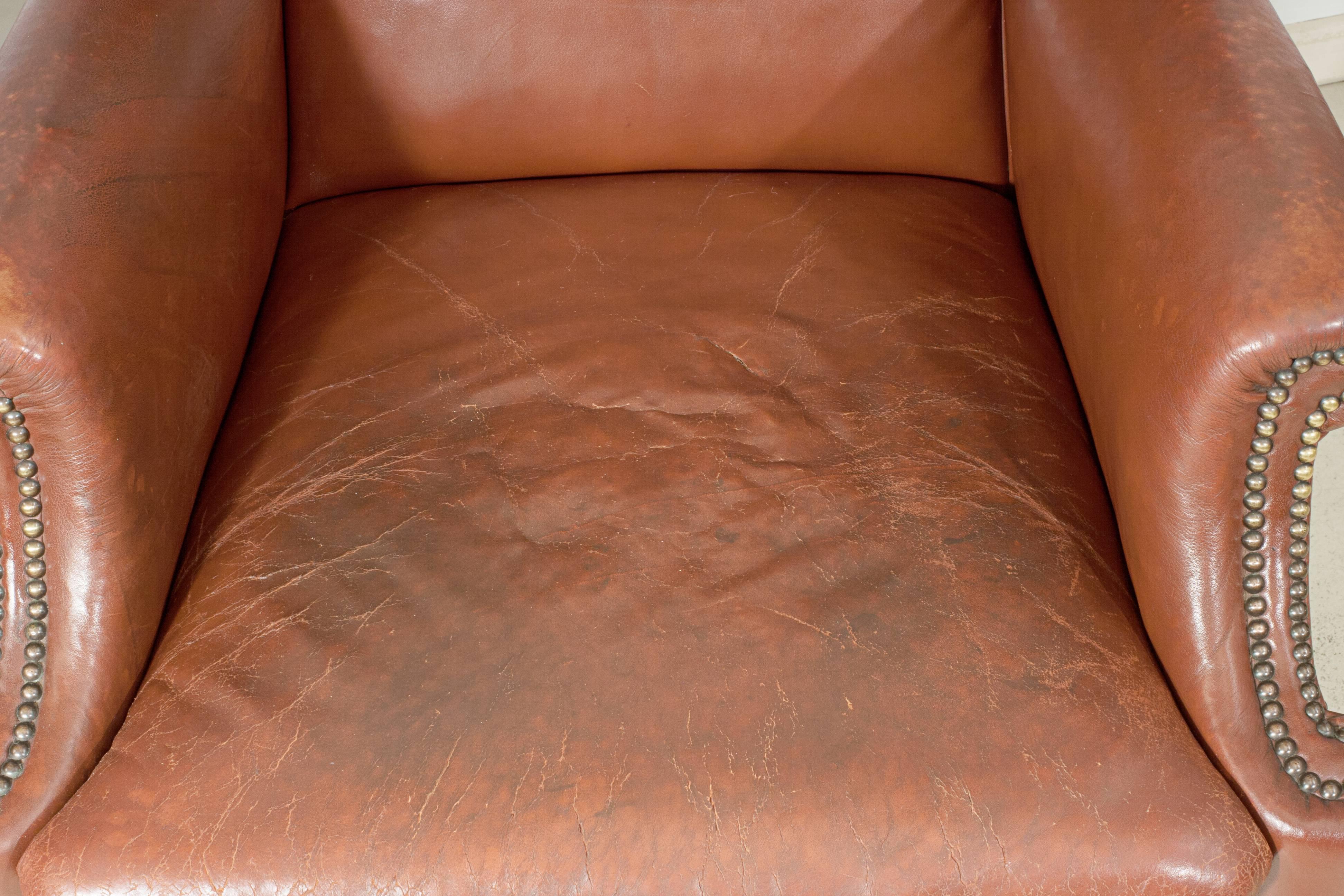 Leather Pair of Wing Armchairs