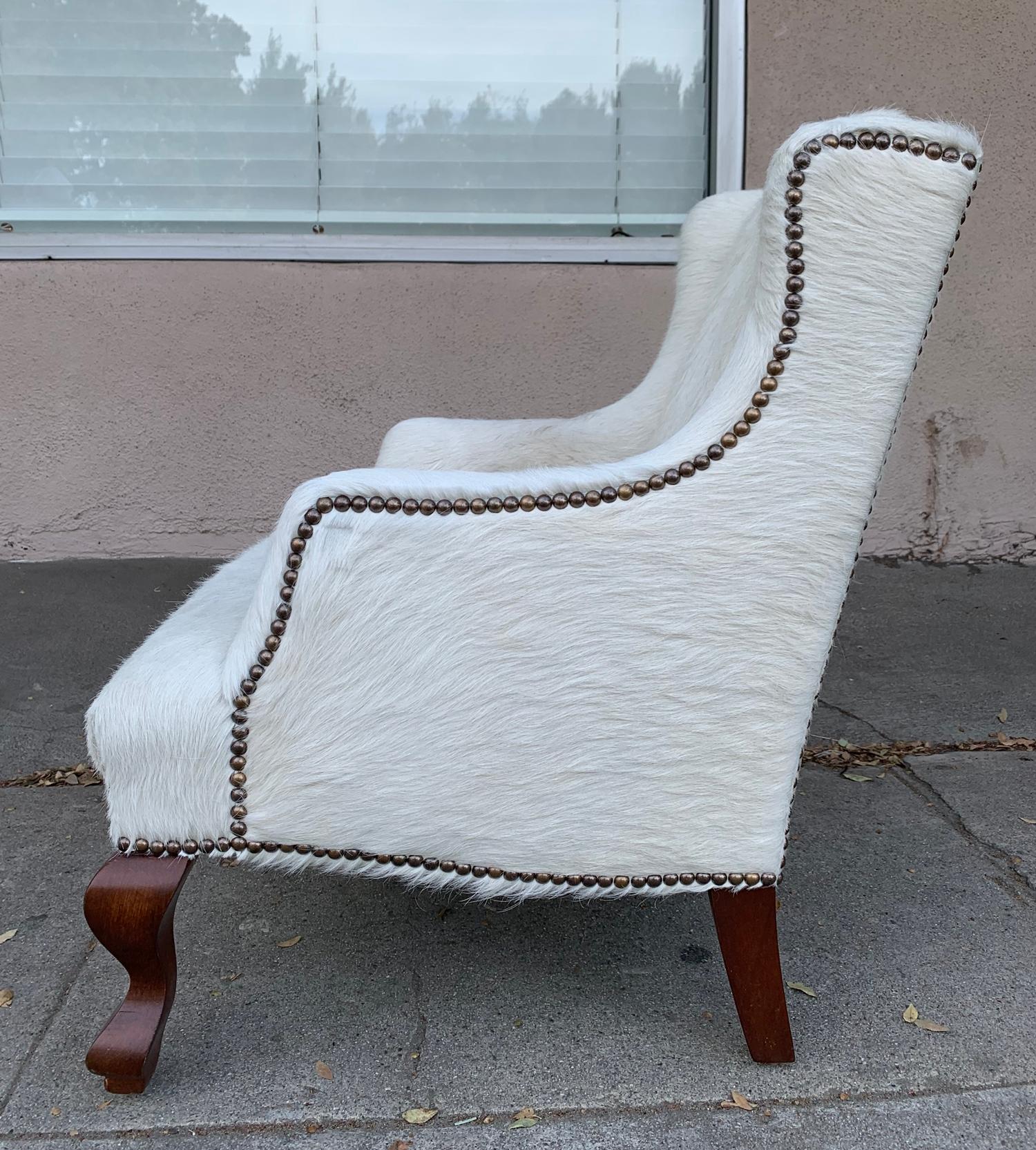 Pair of Wingback Chairs 1 in Brown Cowhide and 1 in White Cowhide Leather 4