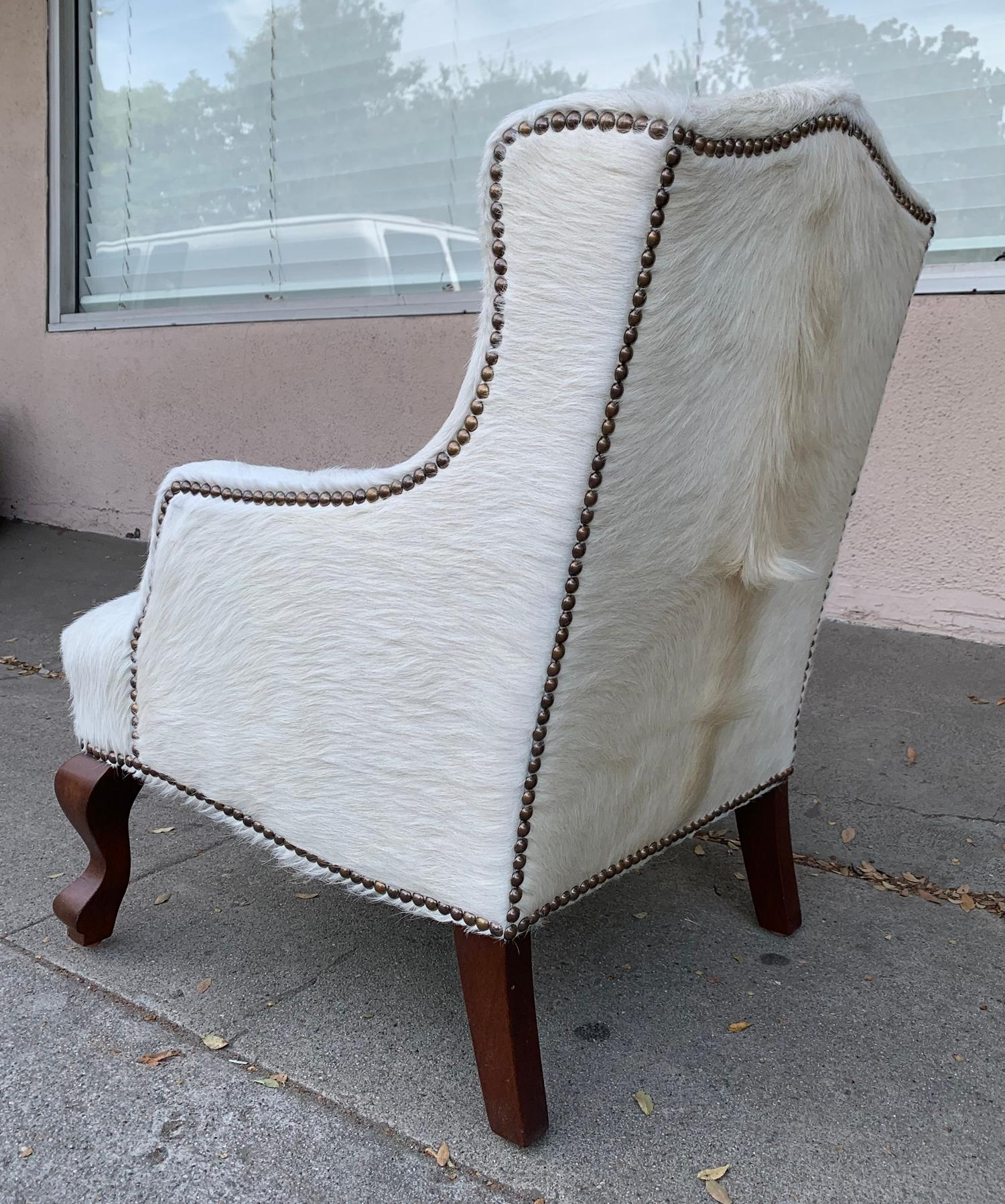 Pair of Wingback Chairs 1 in Brown Cowhide and 1 in White Cowhide Leather 6