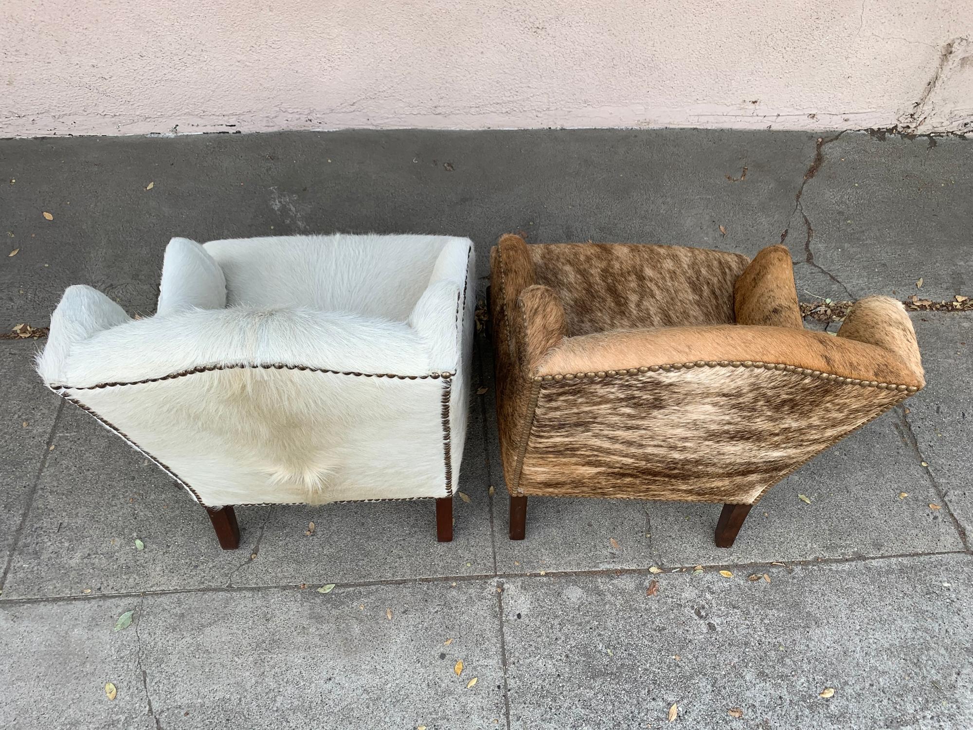 Pair of Wingback Chairs 1 in Brown Cowhide and 1 in White Cowhide Leather 11