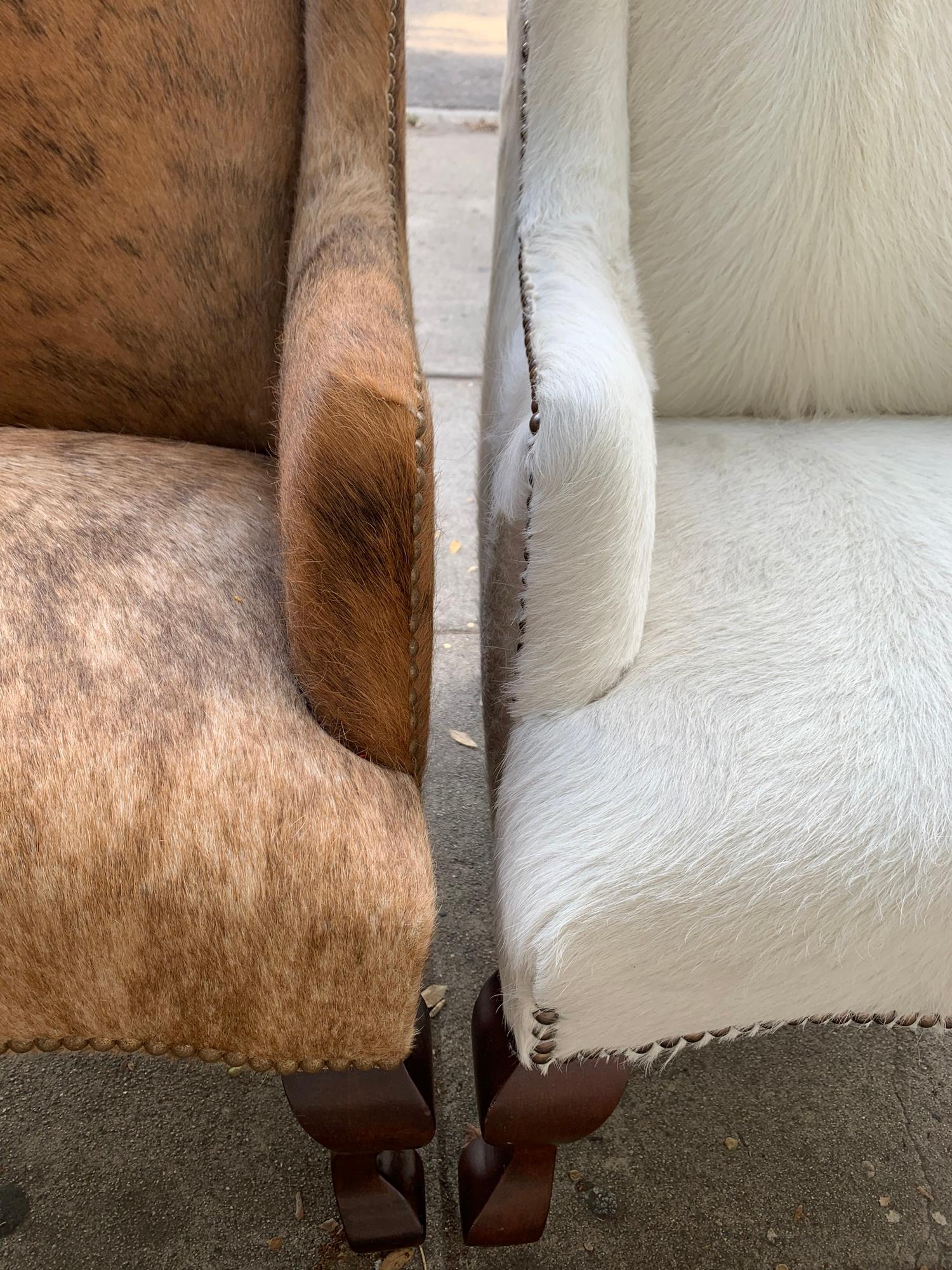 Modern Pair of Wingback Chairs 1 in Brown Cowhide and 1 in White Cowhide Leather