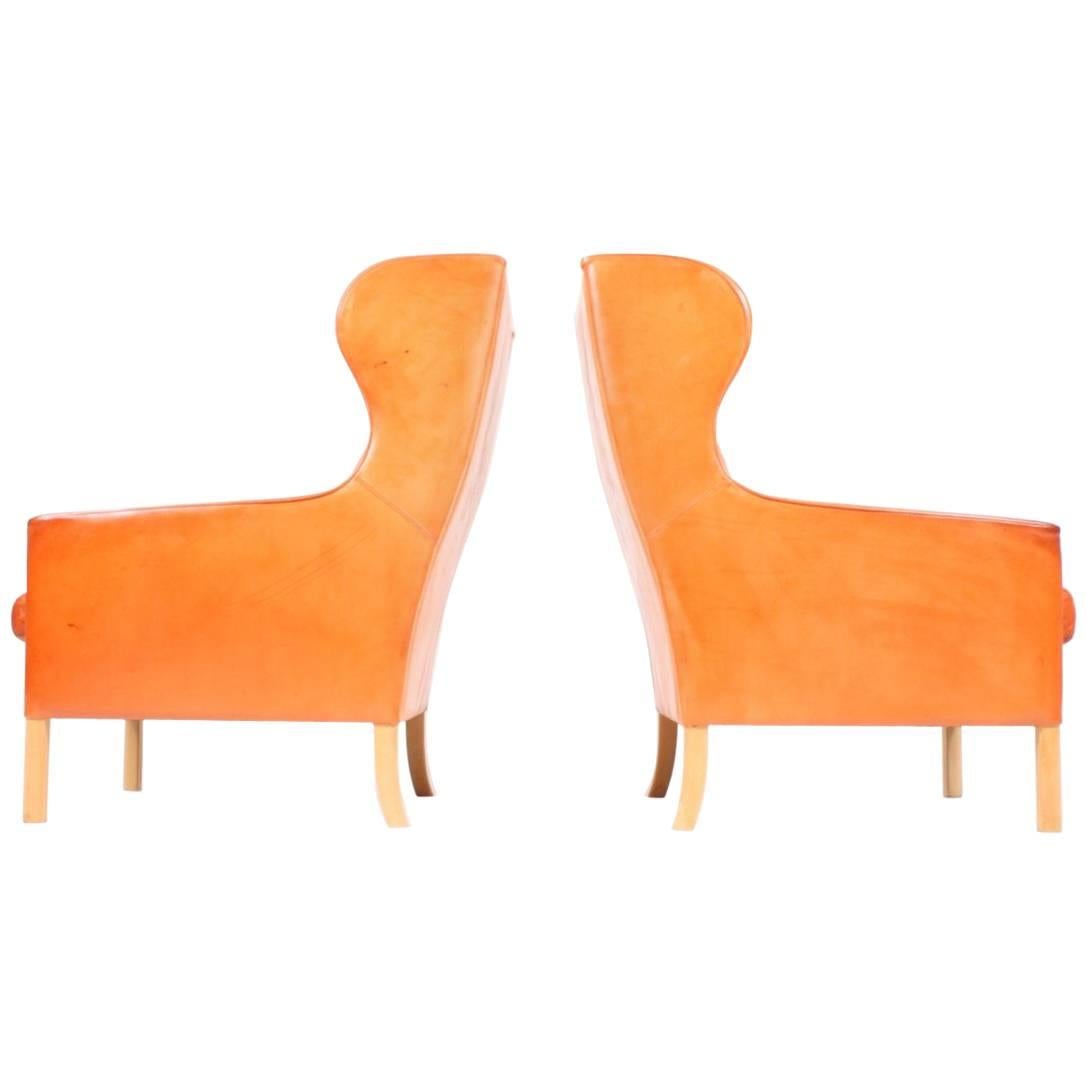 Pair of Wingback Chairs in Leather