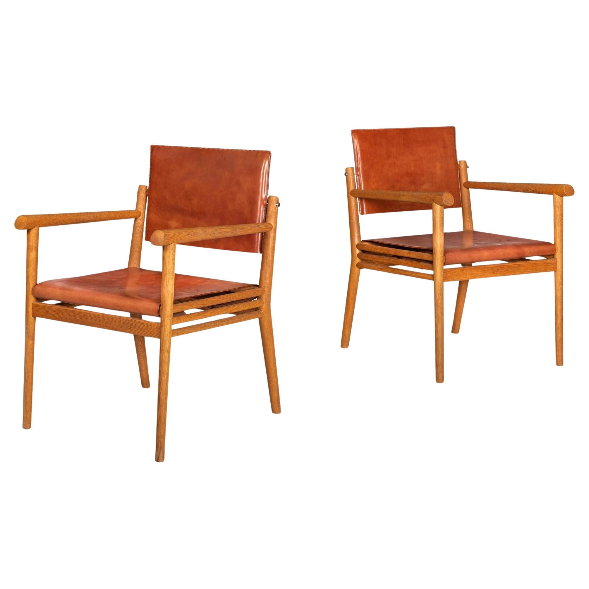 Pair of Wire-Brushed Oak and Leather Arm Chairs after Jean-Michel Frank For Sale