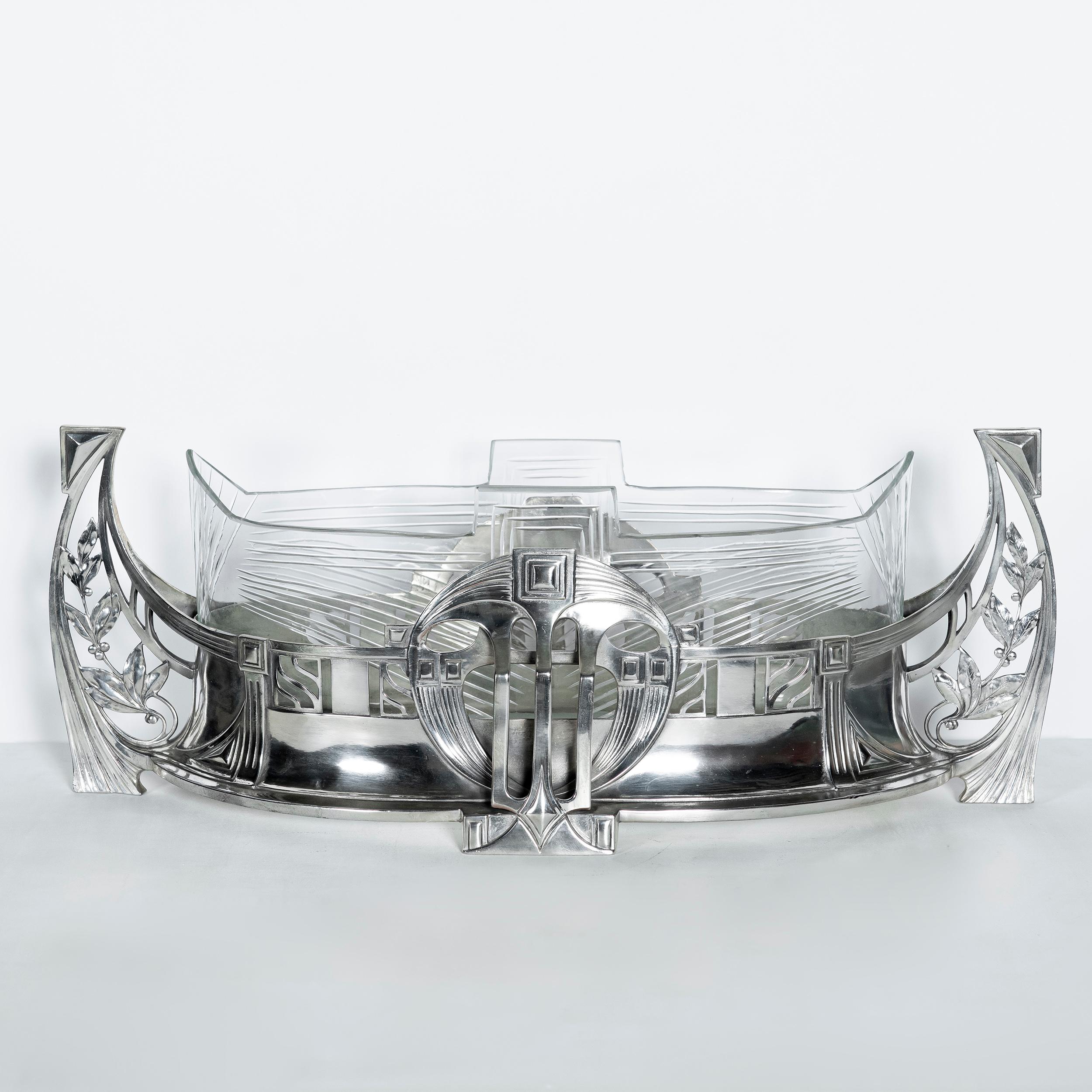 Pair of W.M.F. silver plate jardinière with glass, Jugendstil period, circa 1900.