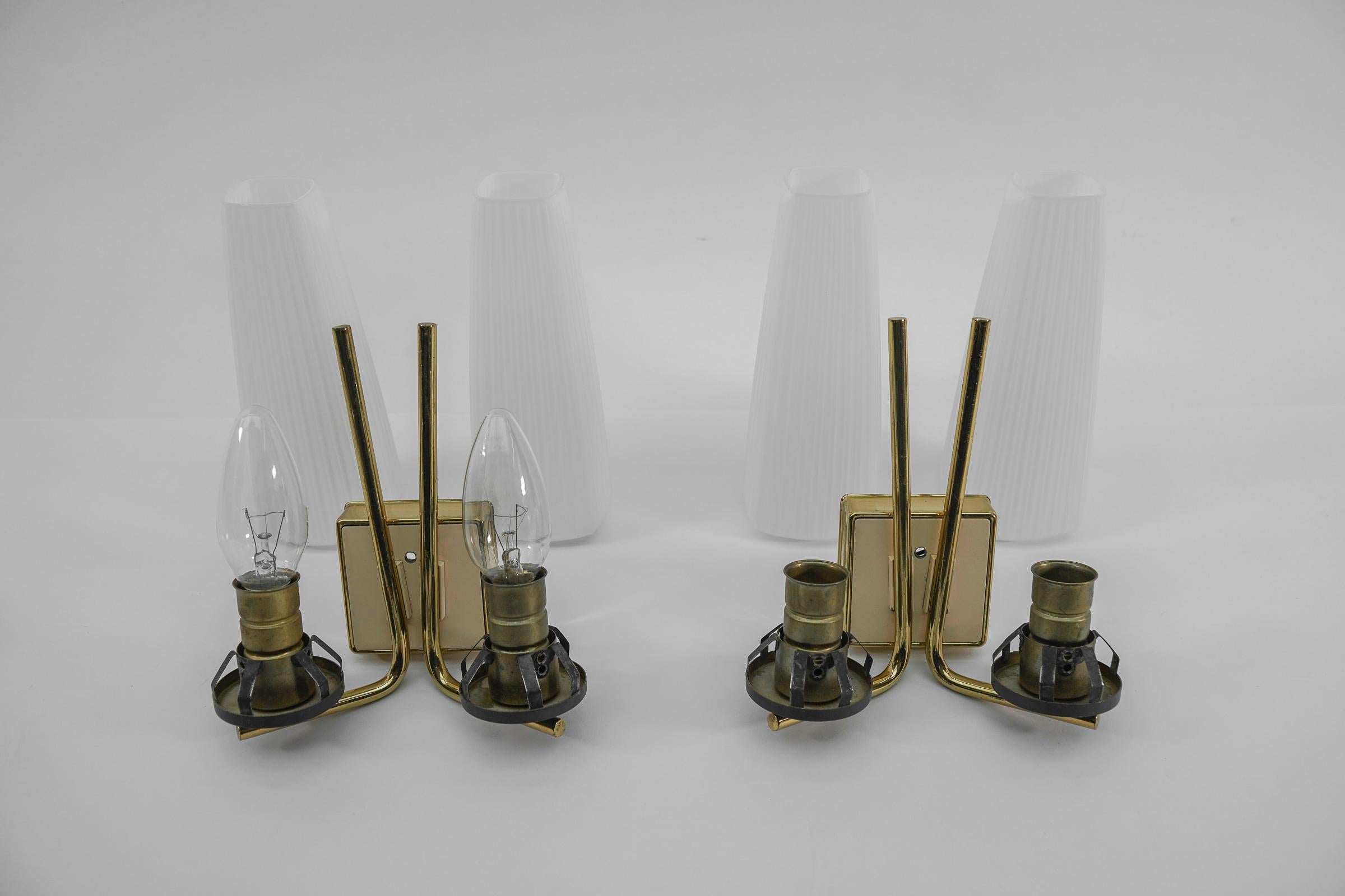 Metal Pair of Wonderful Mid-Century Modern Double Wall Lamps in Brass and Opal Glass For Sale