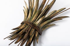 Pair of wood and bronze sconces attributed to Maison Jansen. France, circa 1950.