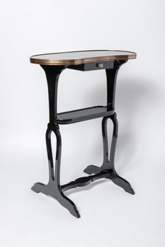 Pair of wood and bronze side tables by Maison Jansen. France, circa 1950.