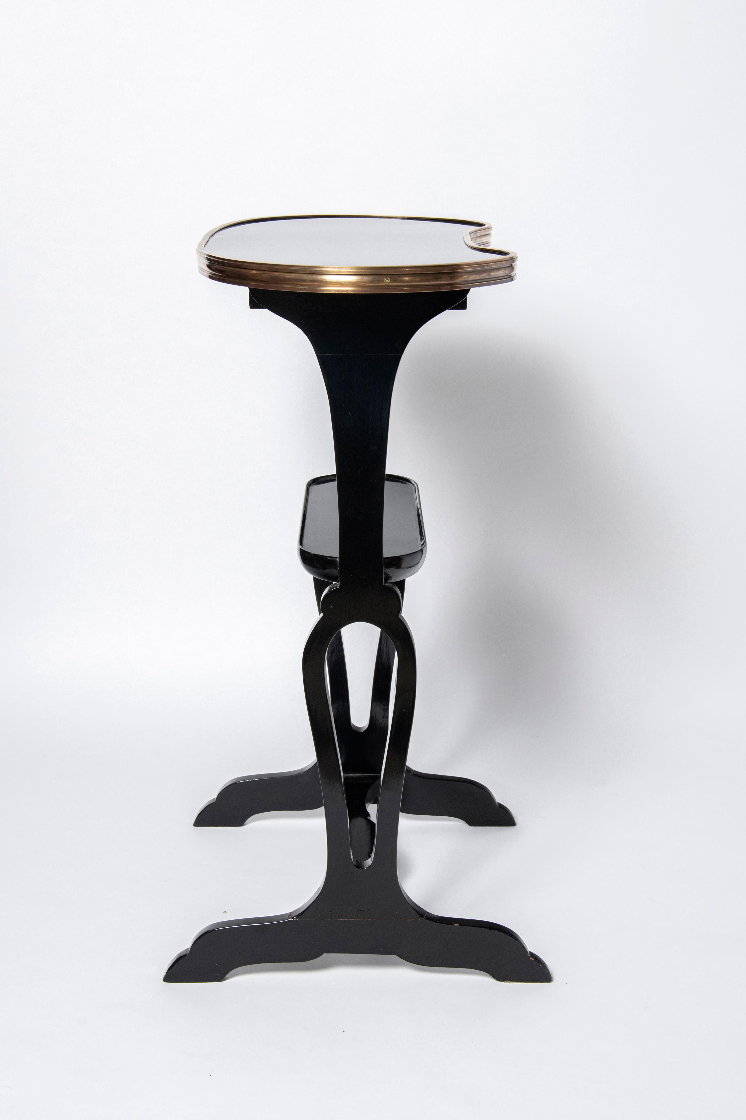 French Pair of wood and bronze side tables by Maison Jansen. France, circa 1950. For Sale