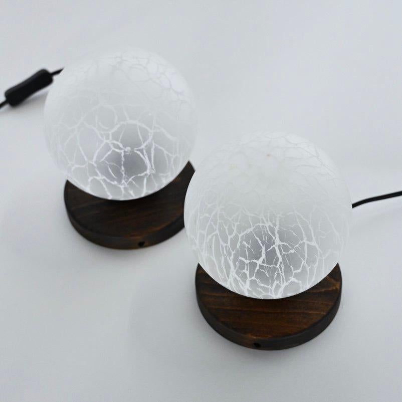 Pair of wood and crackle effect glass globe table lamps. Yugoslavia circa 1970. In Good Condition For Sale In Venice, CA