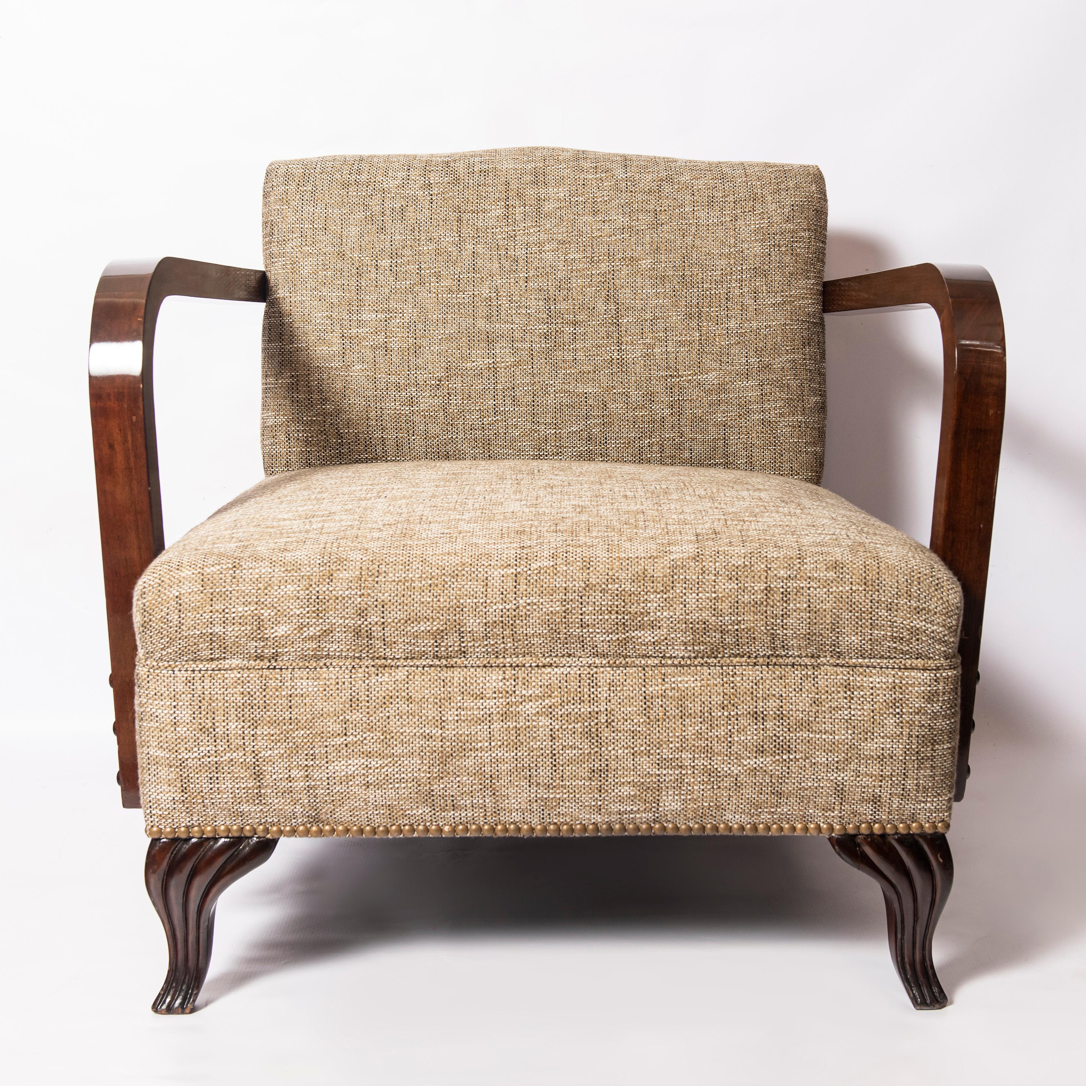 Pair of wood and fabric armchairs. Art Deco Period. France, circa 1940.