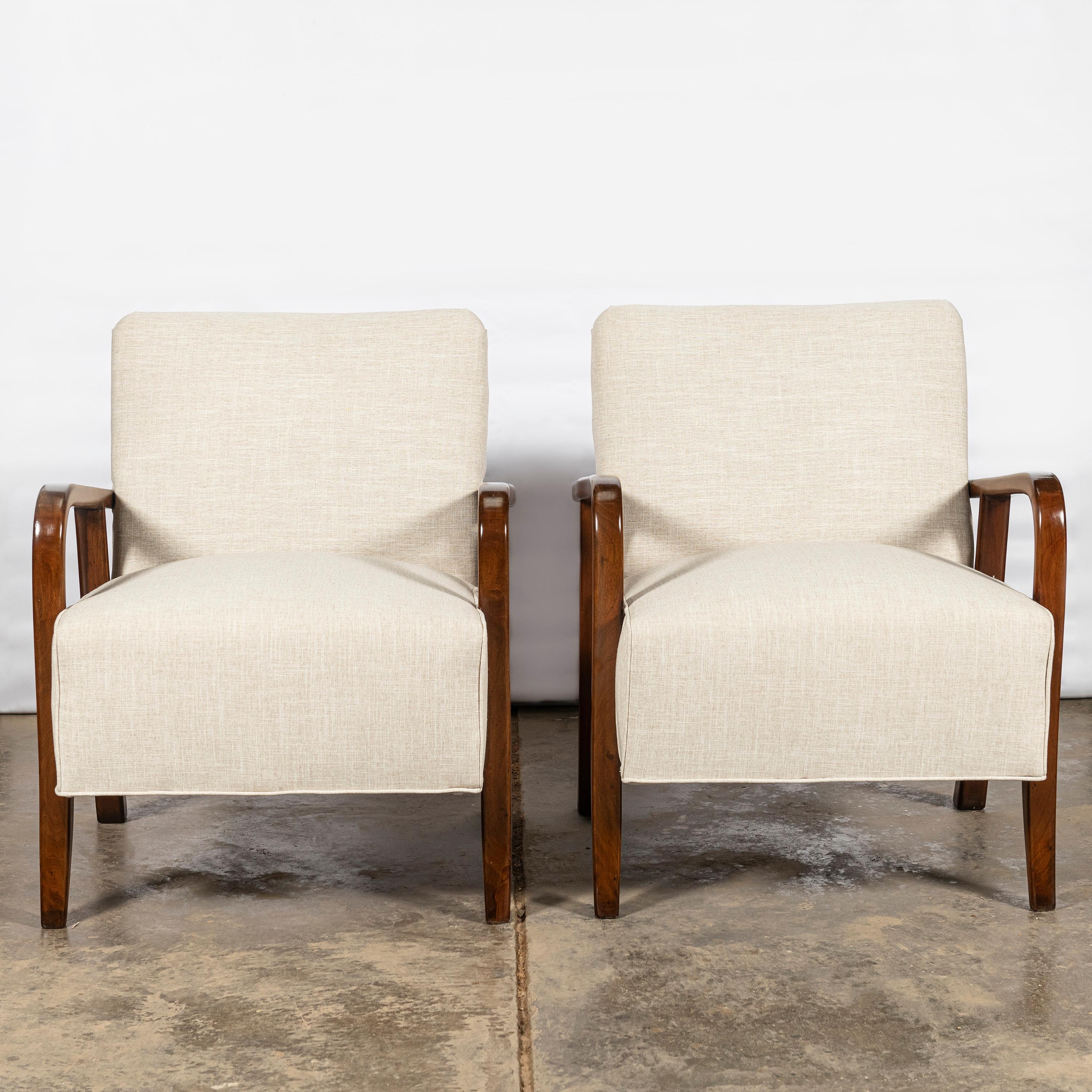 Pair of wood and fabric armchairs by Nordiska. Argentina, circa 1950.