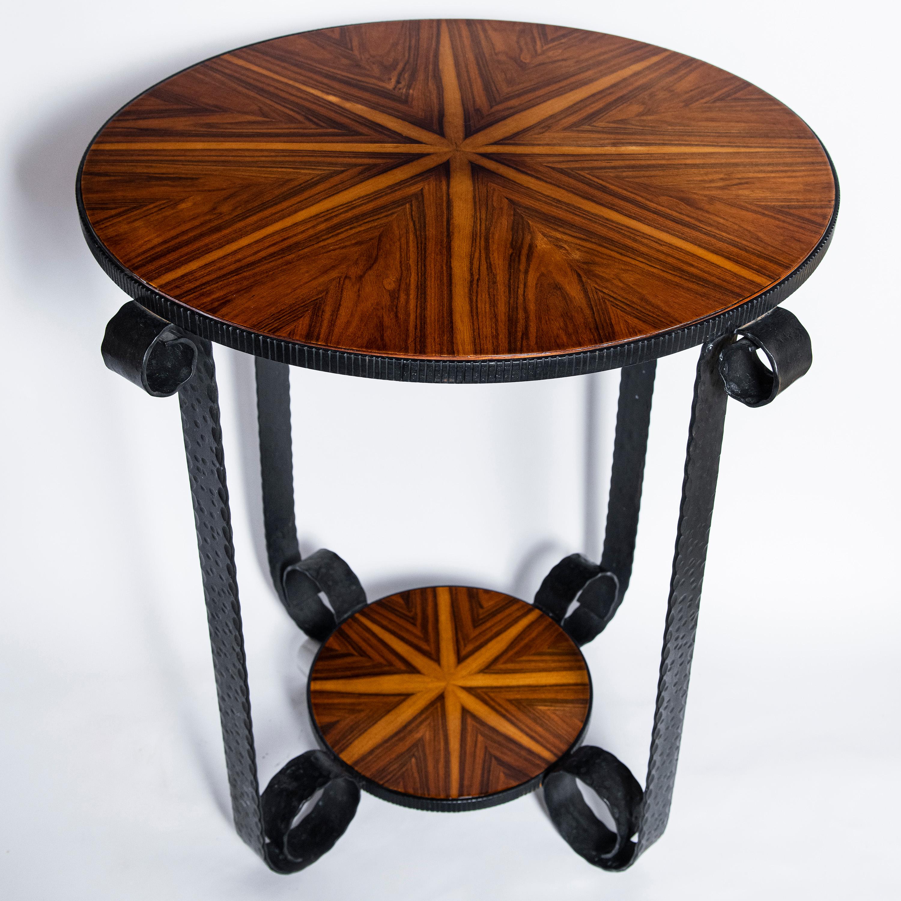 Pair of wood and iron side tables. Art Deco period. France, circa 1930.