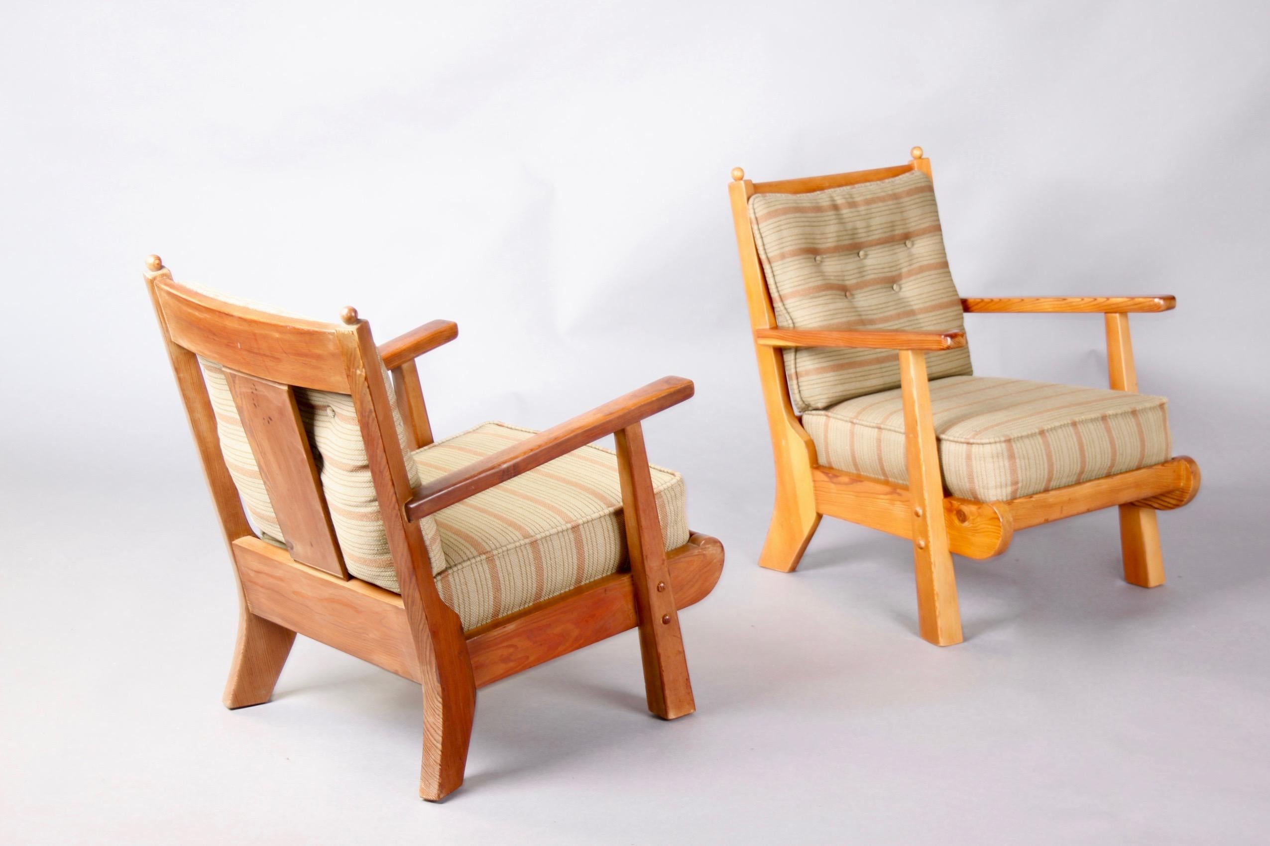 European Pair of wood and leather mid century armchairs For Sale