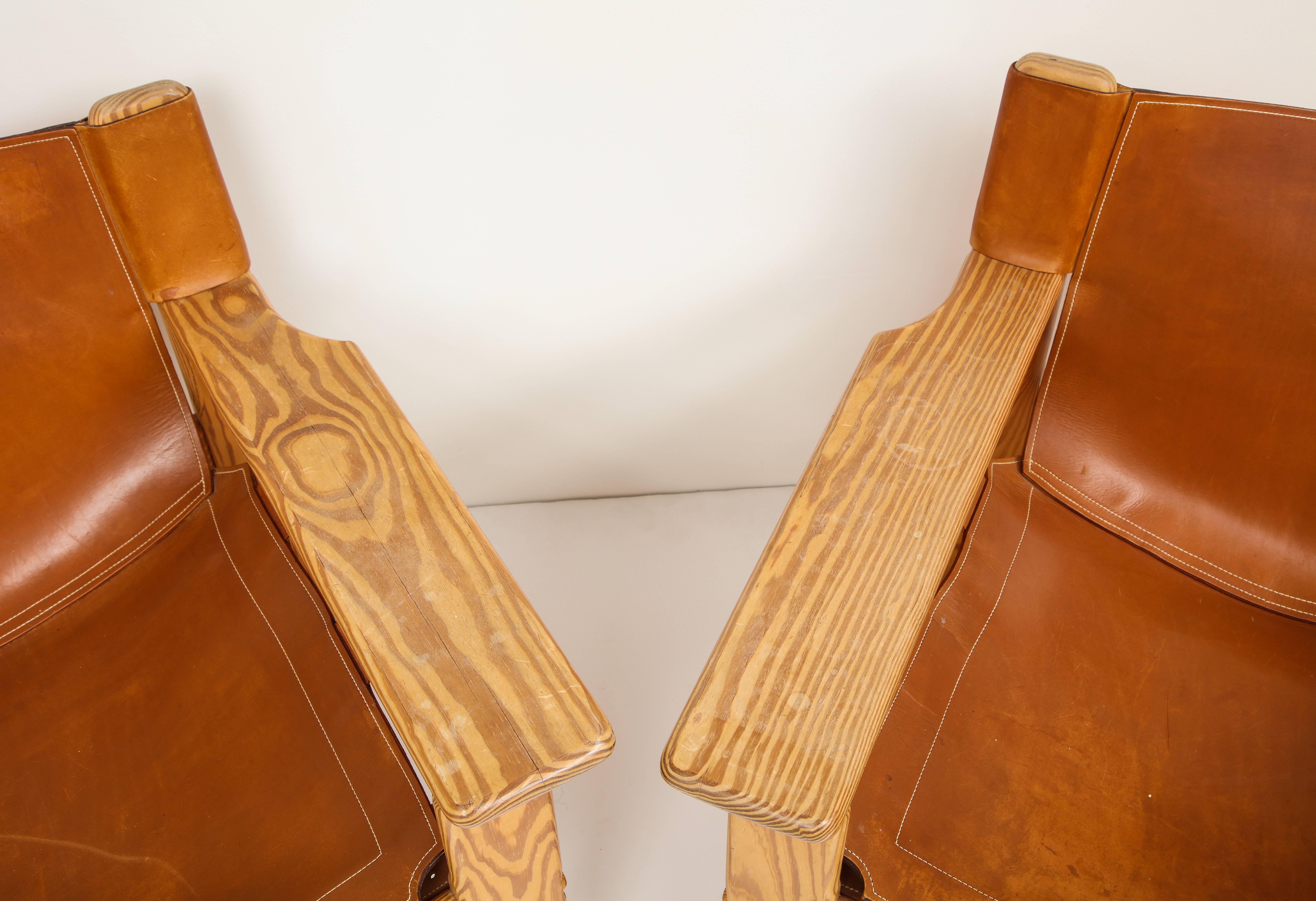 Pair of wood and leather Spanish Safari chairs.