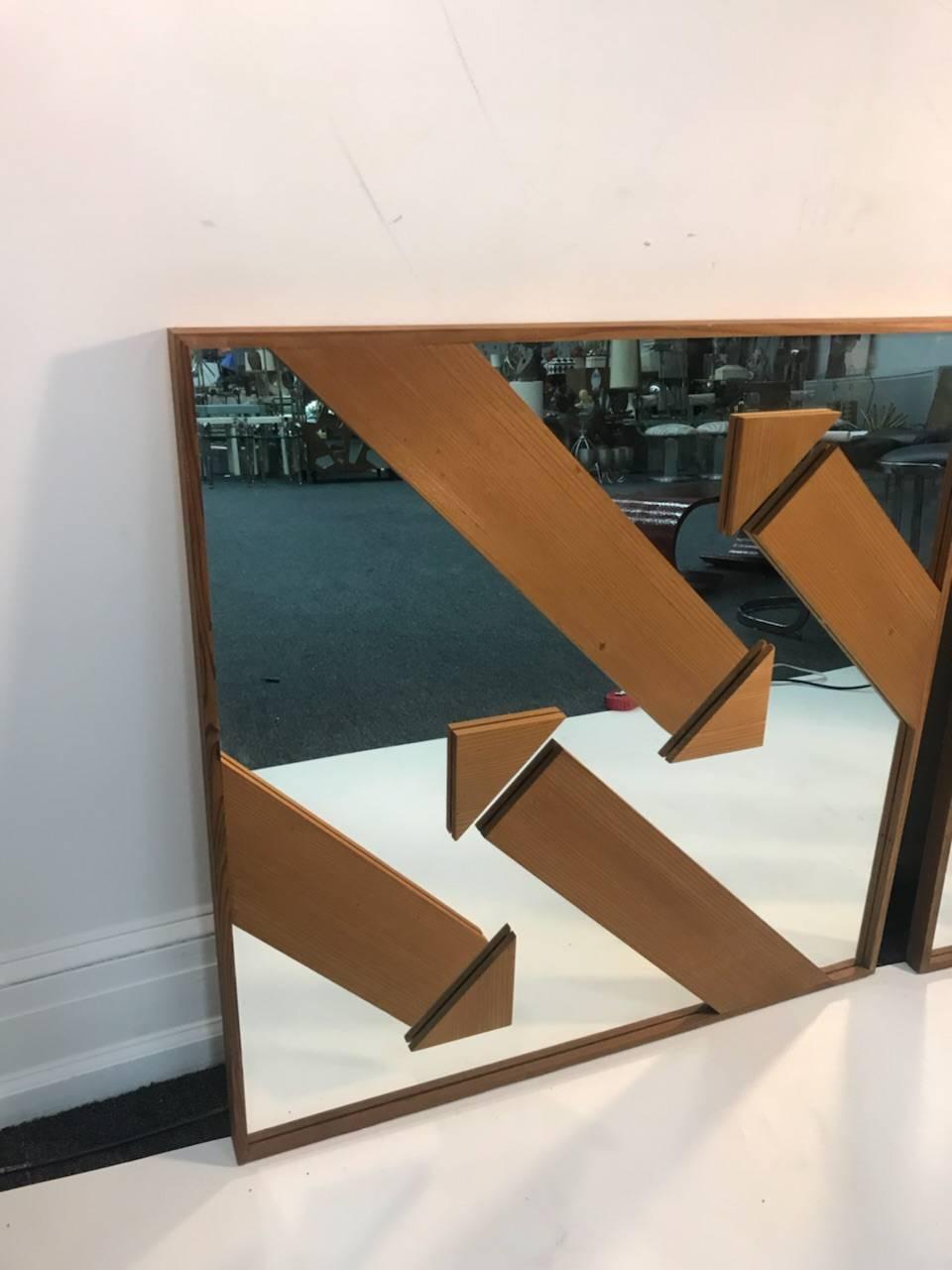 Chamfered Pair of Wood and Mirror Modernist Arrow Wall Mirrors For Sale