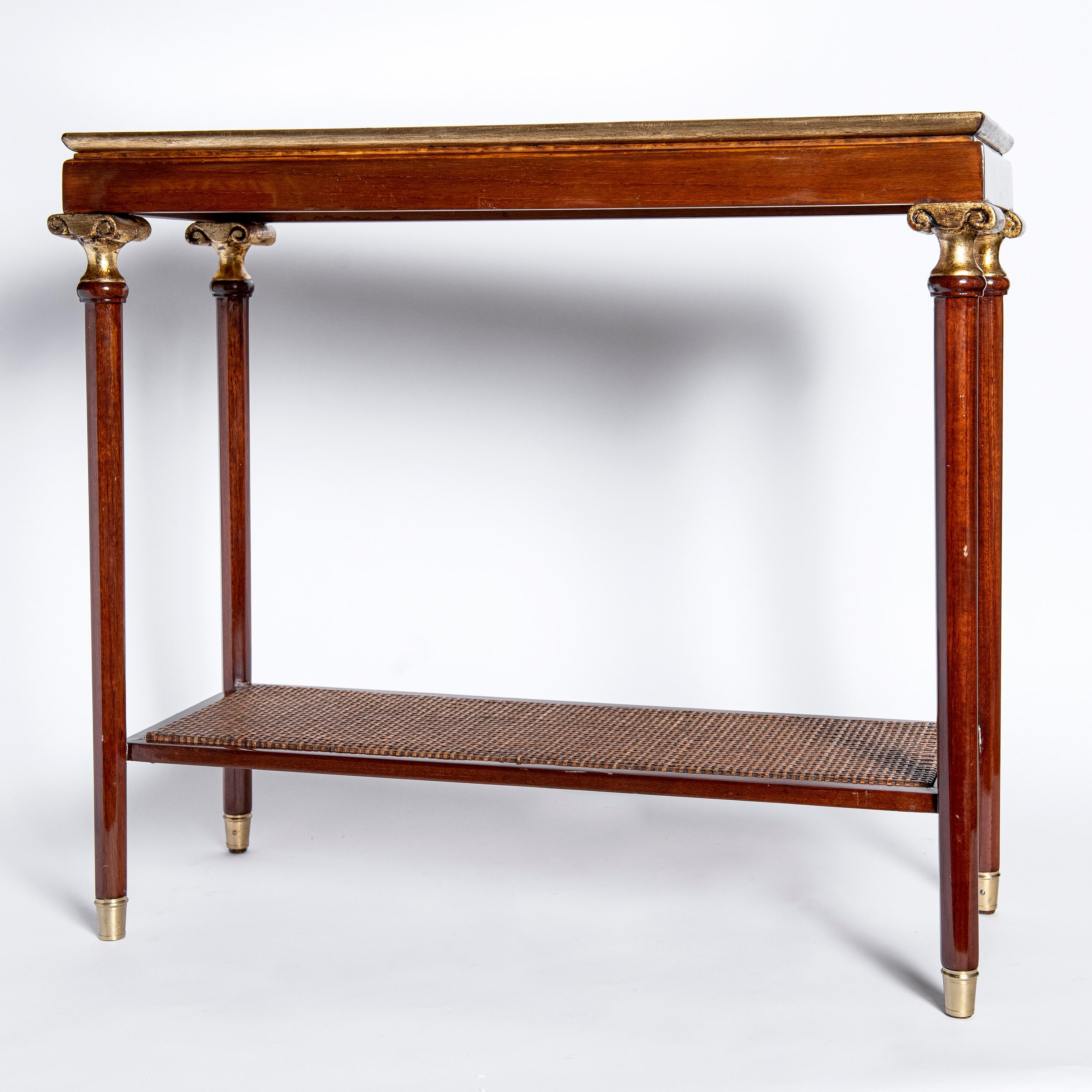 Pair of wood and rattan side tables, France, circa 1950.
With glass on top and gold leaf capitals.
Attributed to Maison Jansen.